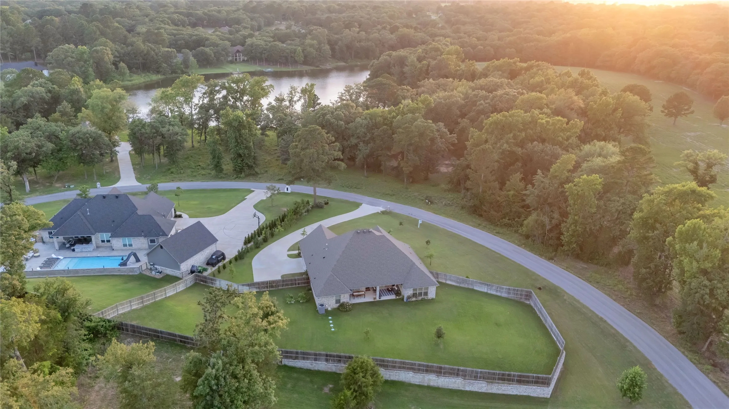 Aeiral view showing close proximity to the lake and views of the sunset landing on the lake like On Golden Pond- Must see in person to appreciate!