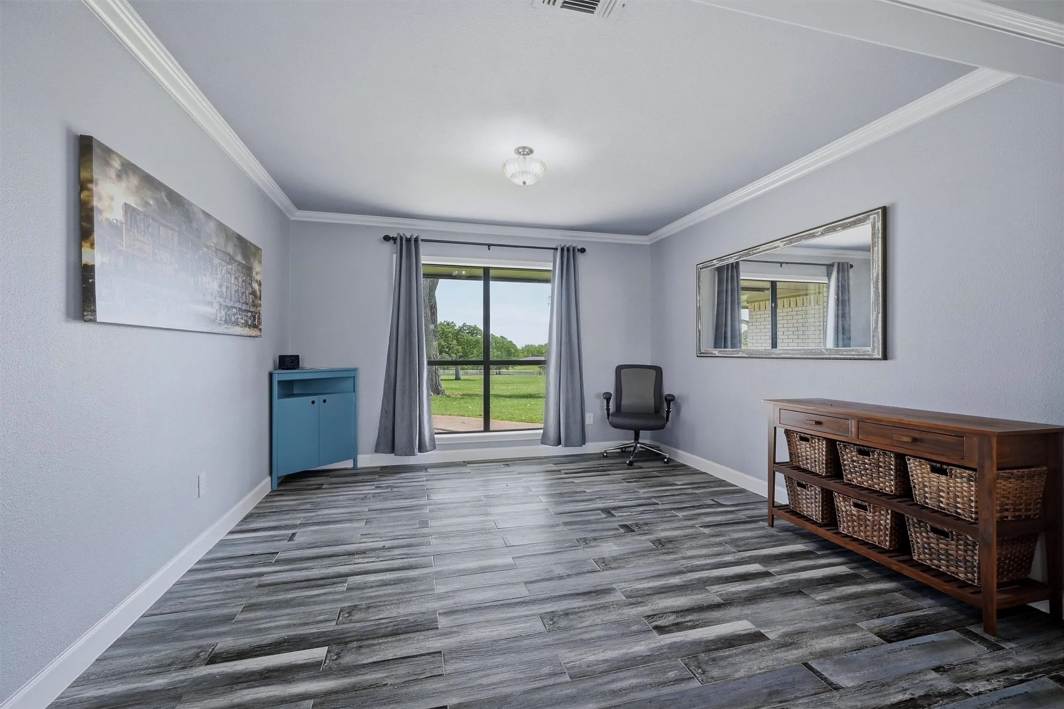 This room makes a perfect office but could be used as a media or game room.