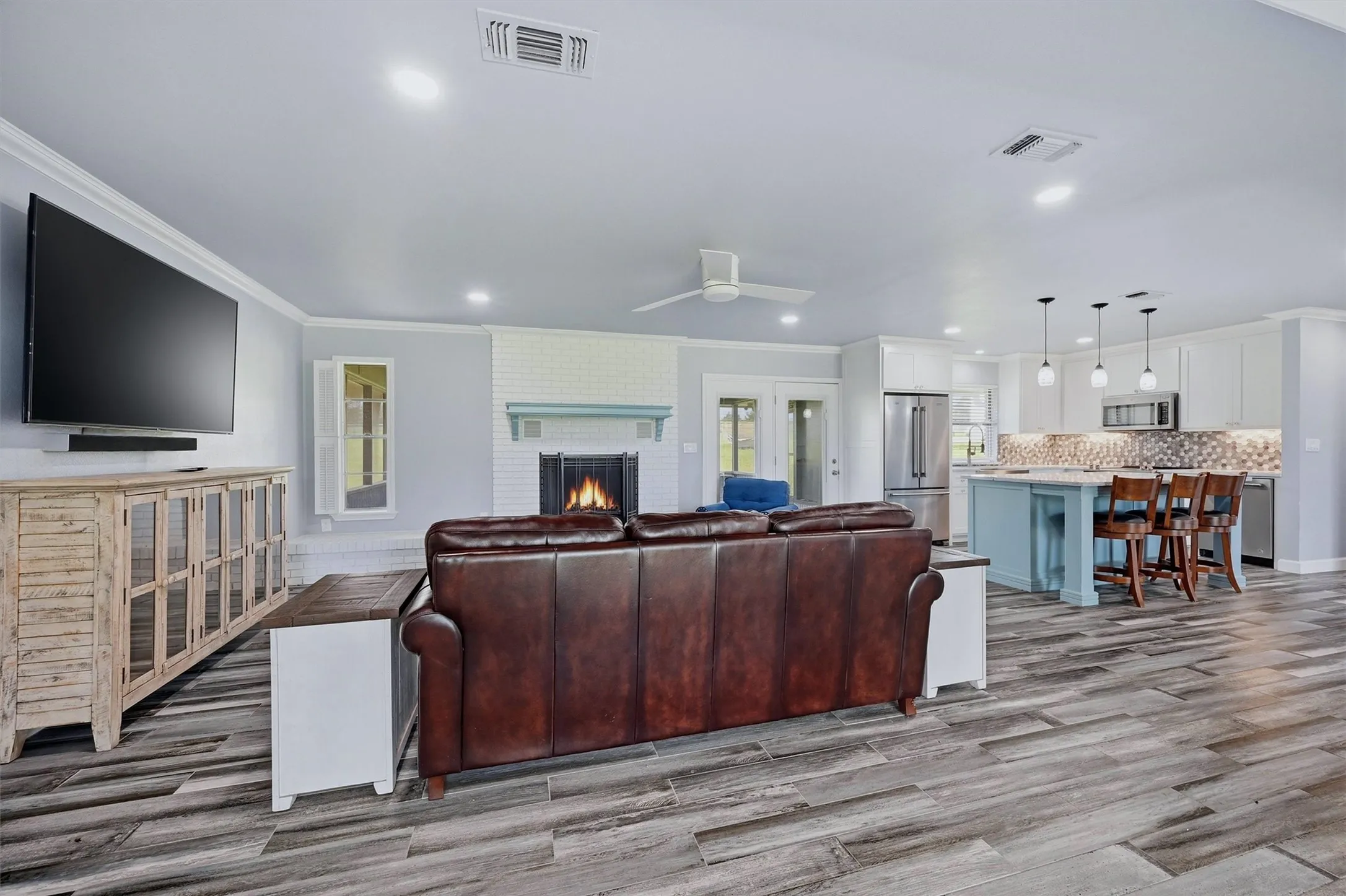 Open floor plan between the living area and kitchen is perfect for entertaining.