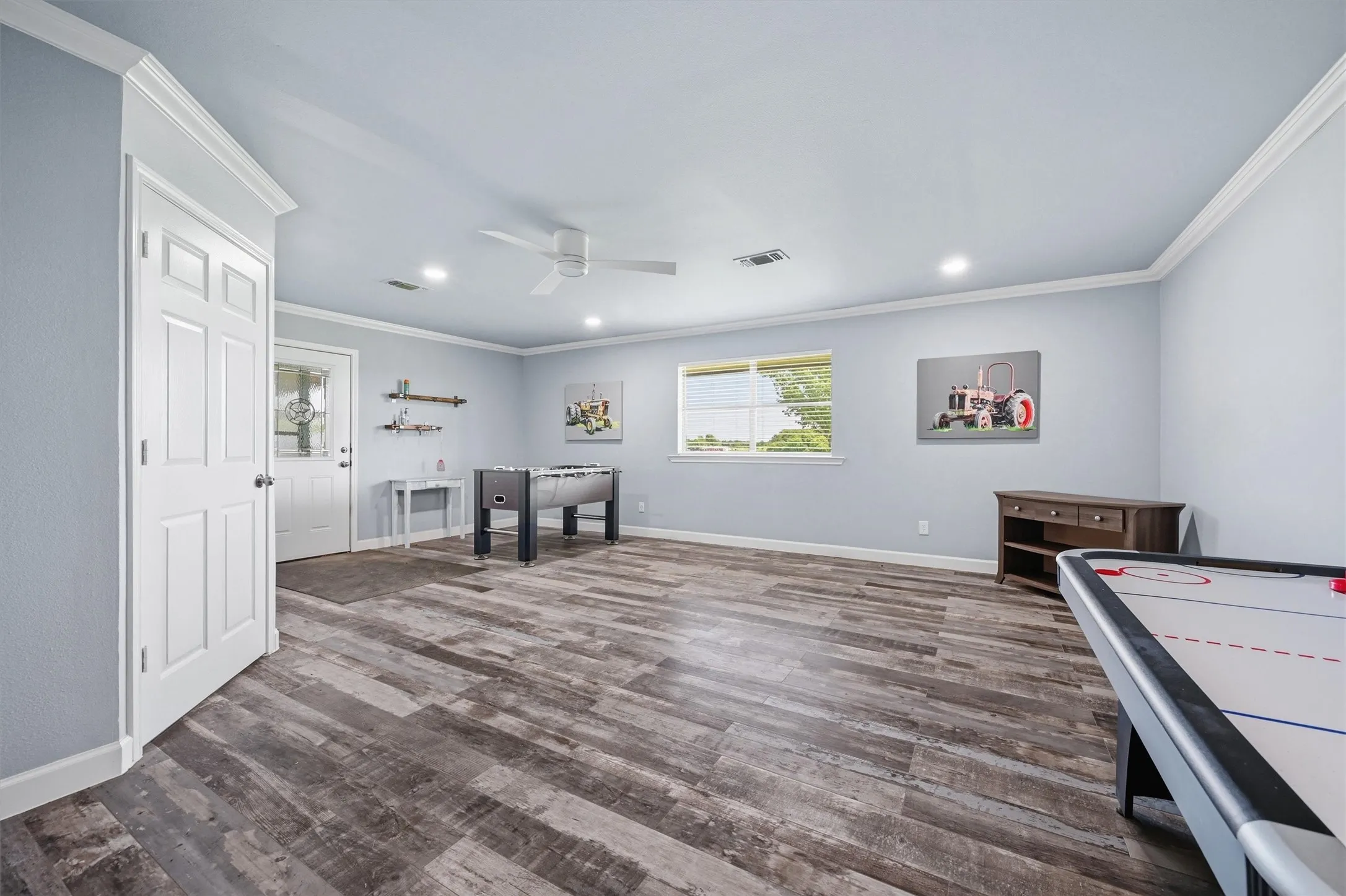 The game room has an exterior door.