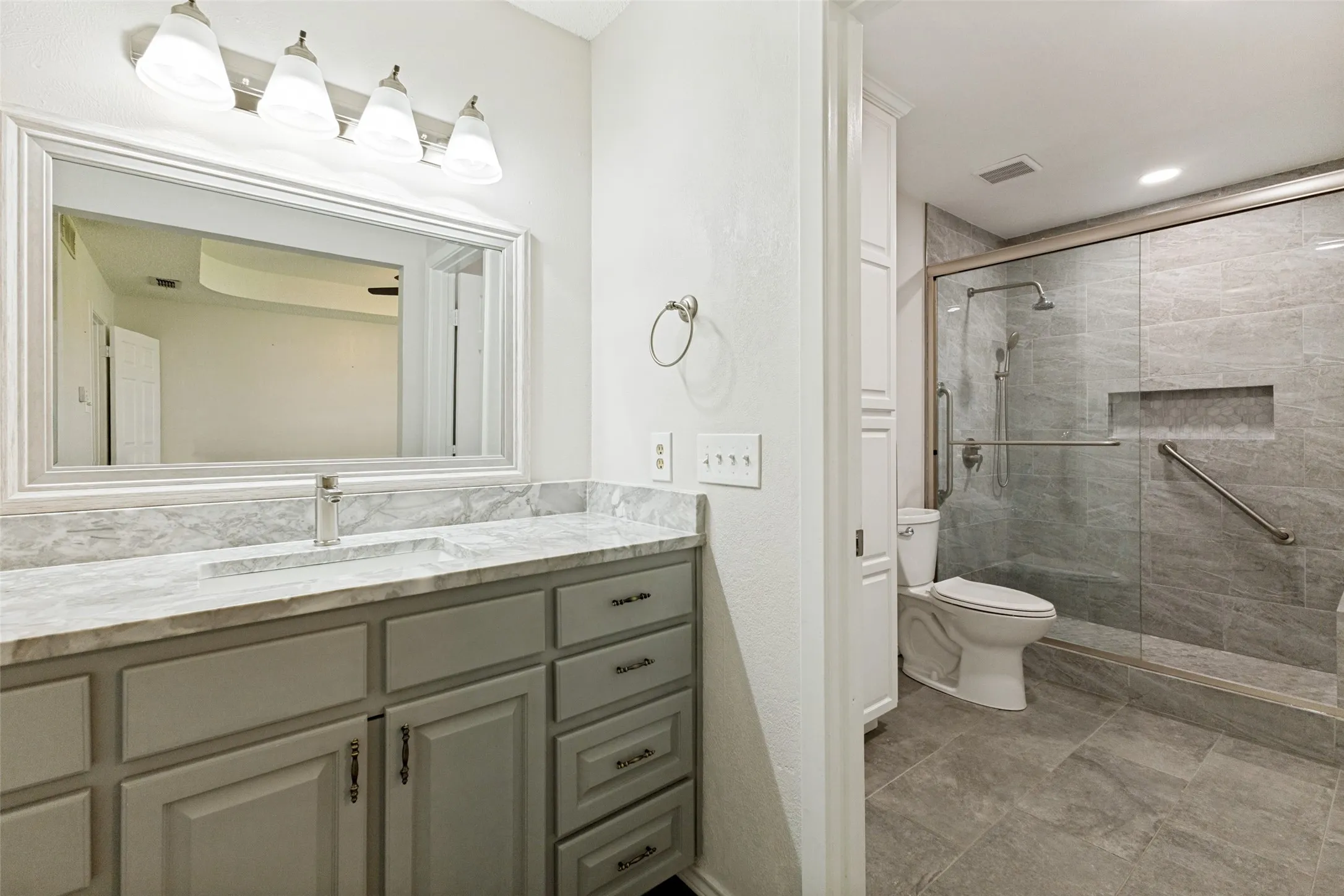 Updated En Suite bath with large walk-in tiled shower