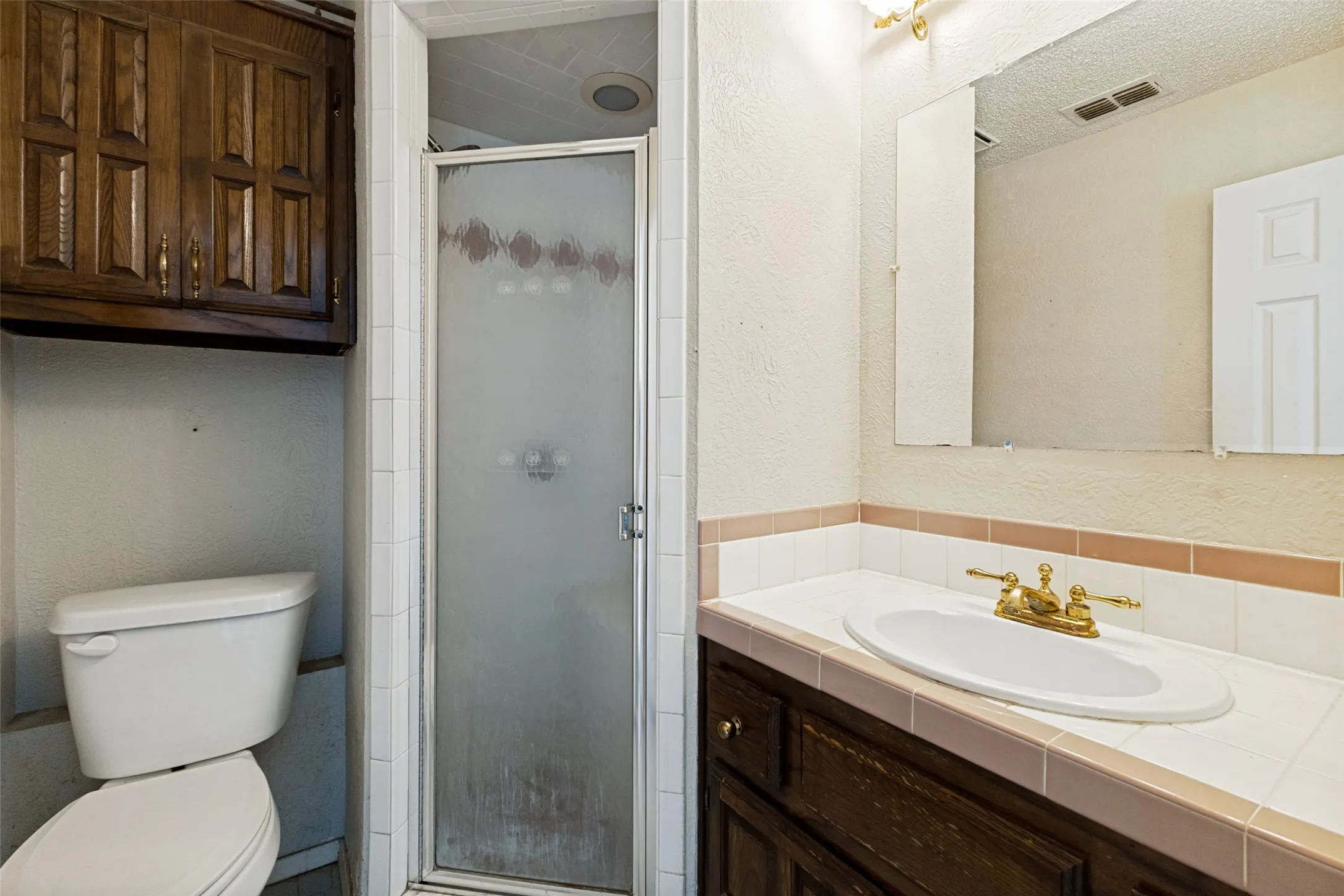 Full bath off garage conversion in utility room with walk in shower (2nd home)