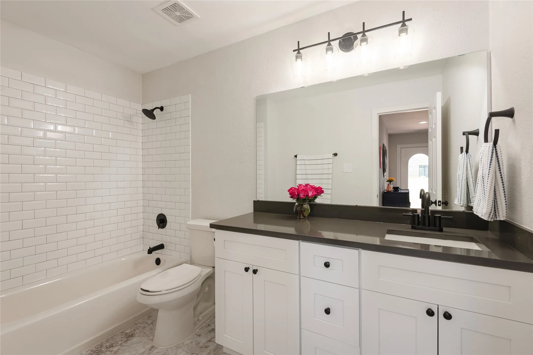 Hall bath plumbed for two sinks