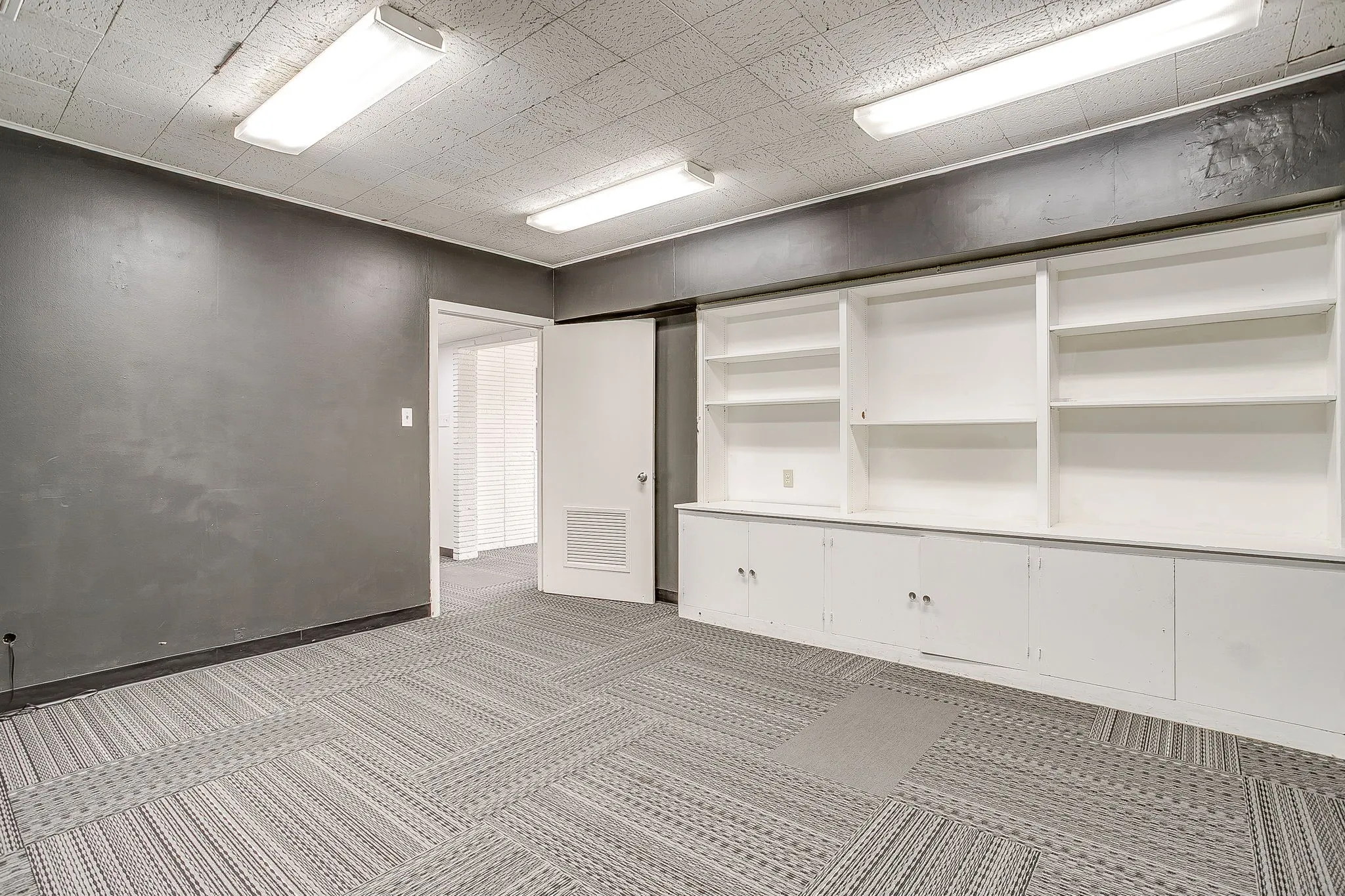 Private office with built-in cabinets