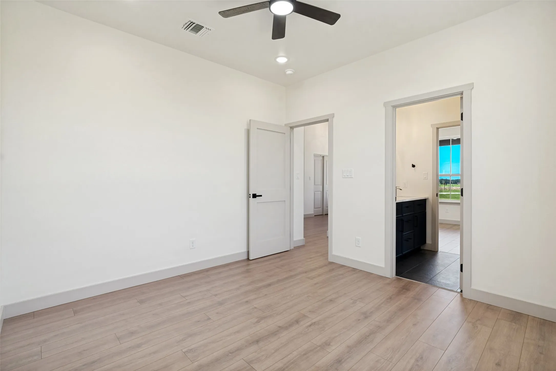 Bedroom 3 featuring wood-finish flooring, recessed lighting, and a ceiling fan