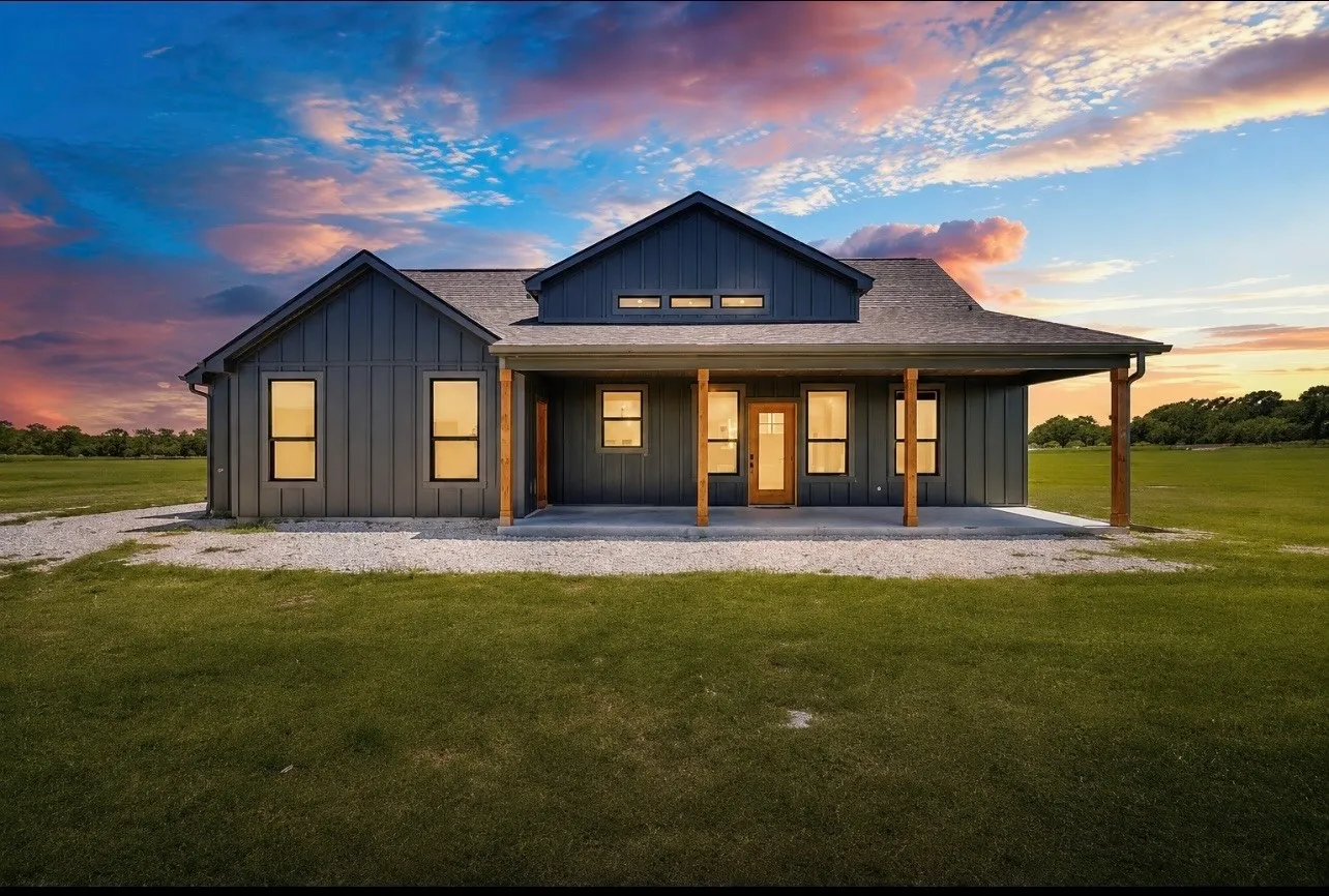 Board and batten exterior with a covered porch