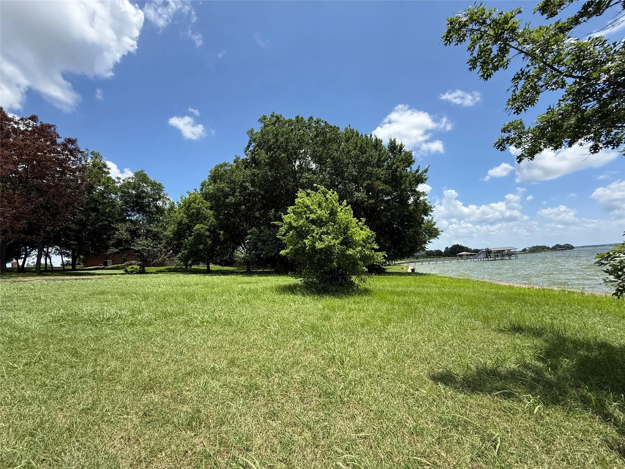 Spacious homesites and wide-open views create an exceptional setting for luxury lake living.