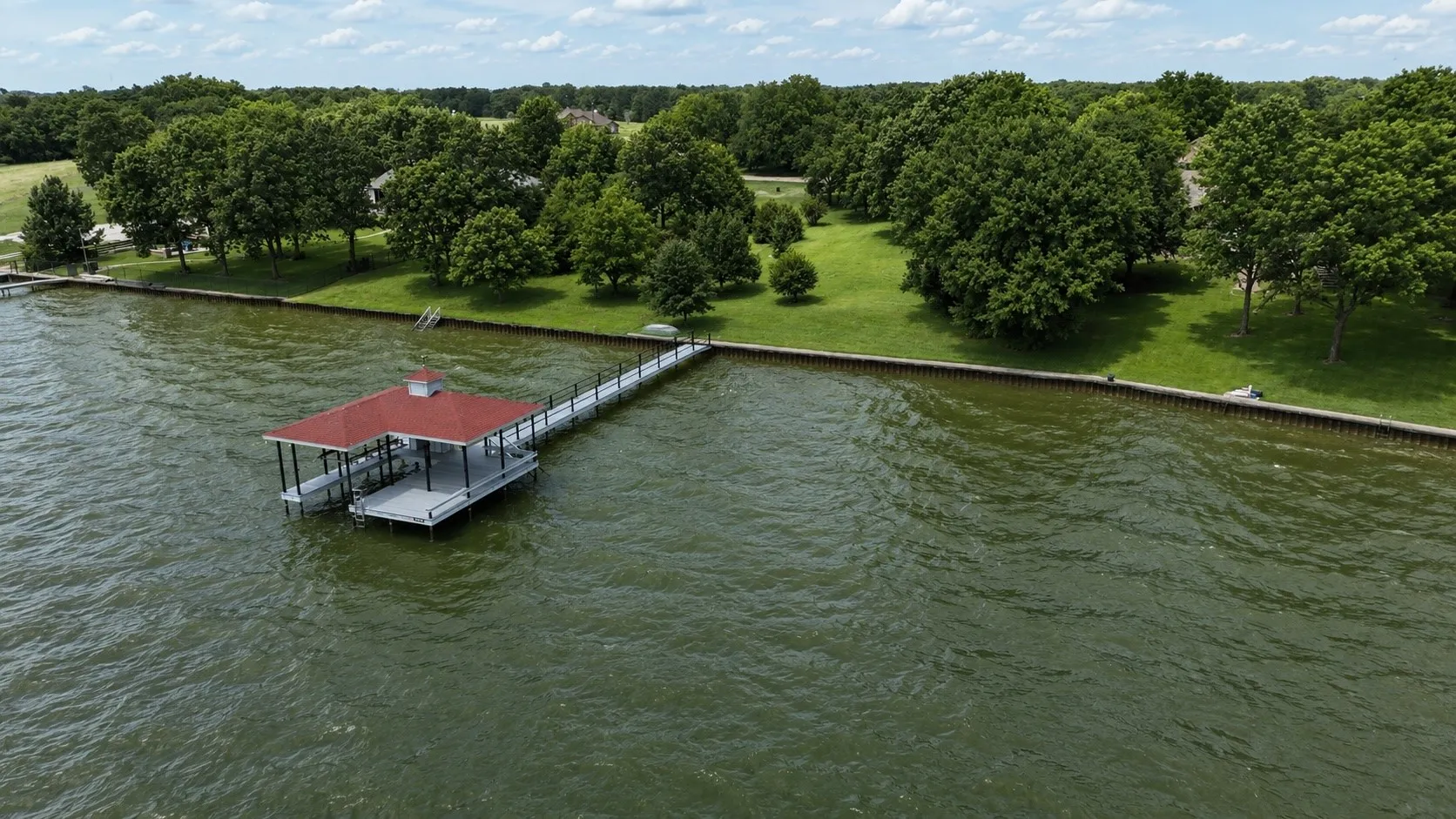 Positioned on the main body of Richland Chambers Lake, this covered boathouse is ready for endless lake adventures.