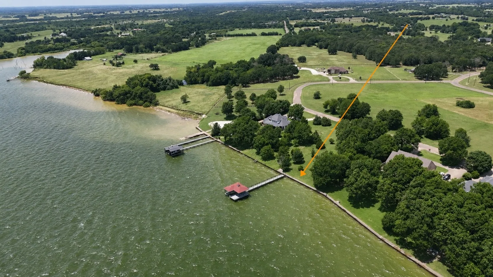 Open water frontage and peaceful shoreline scenery make this area ideal for a custom lake retreat.