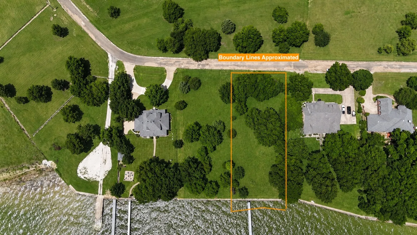 Approximate lot boundaries showcase 0.79 acres of prime waterfront property with valuable improvements already in place.