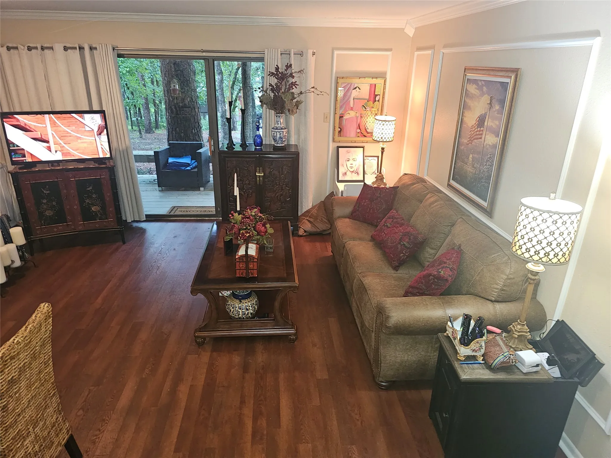 Open concept living area. Back sliding glass doors offer a west view.