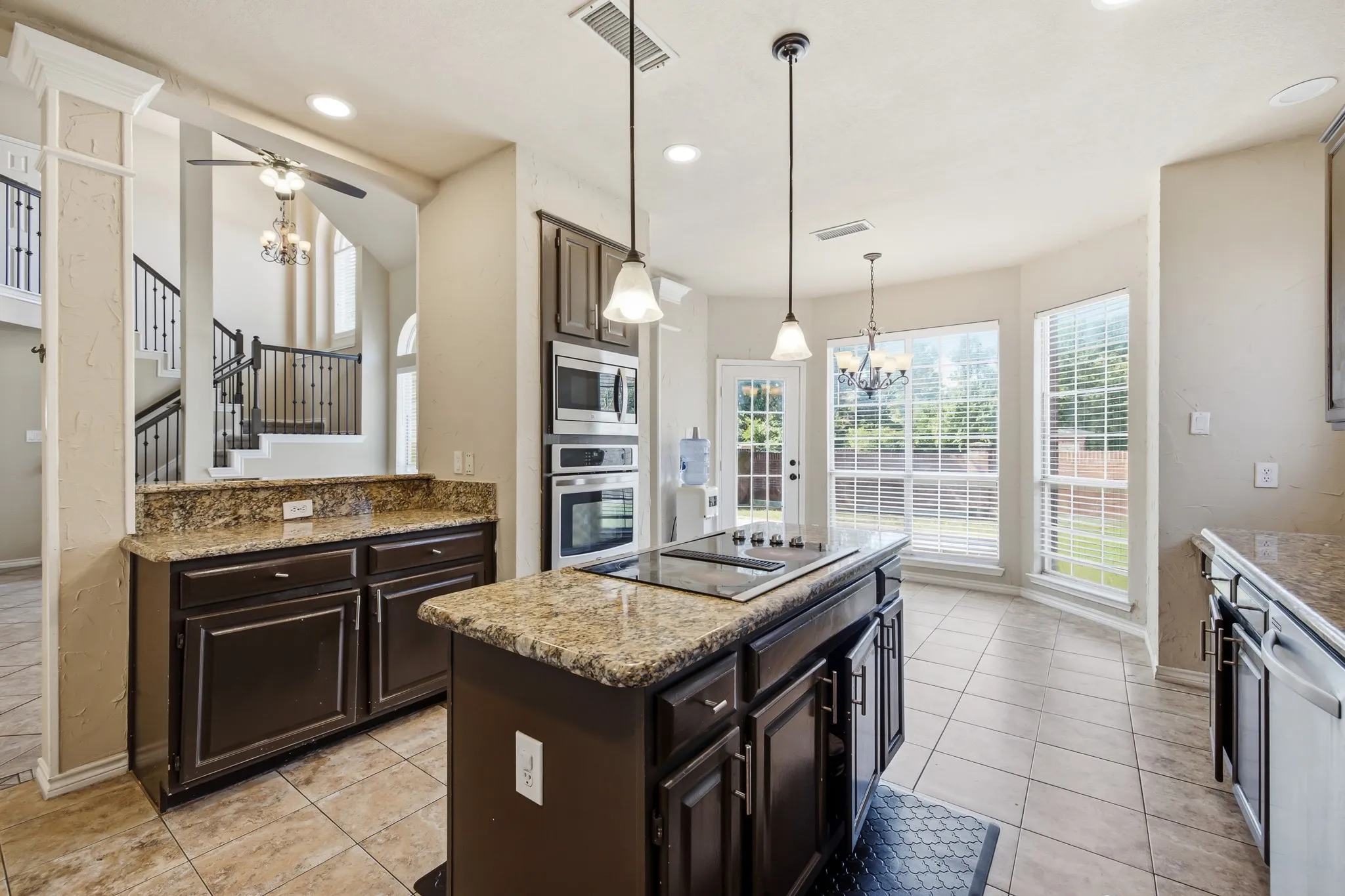 Updated stainless steel oven and microwave, cooktop needs to be replaced.