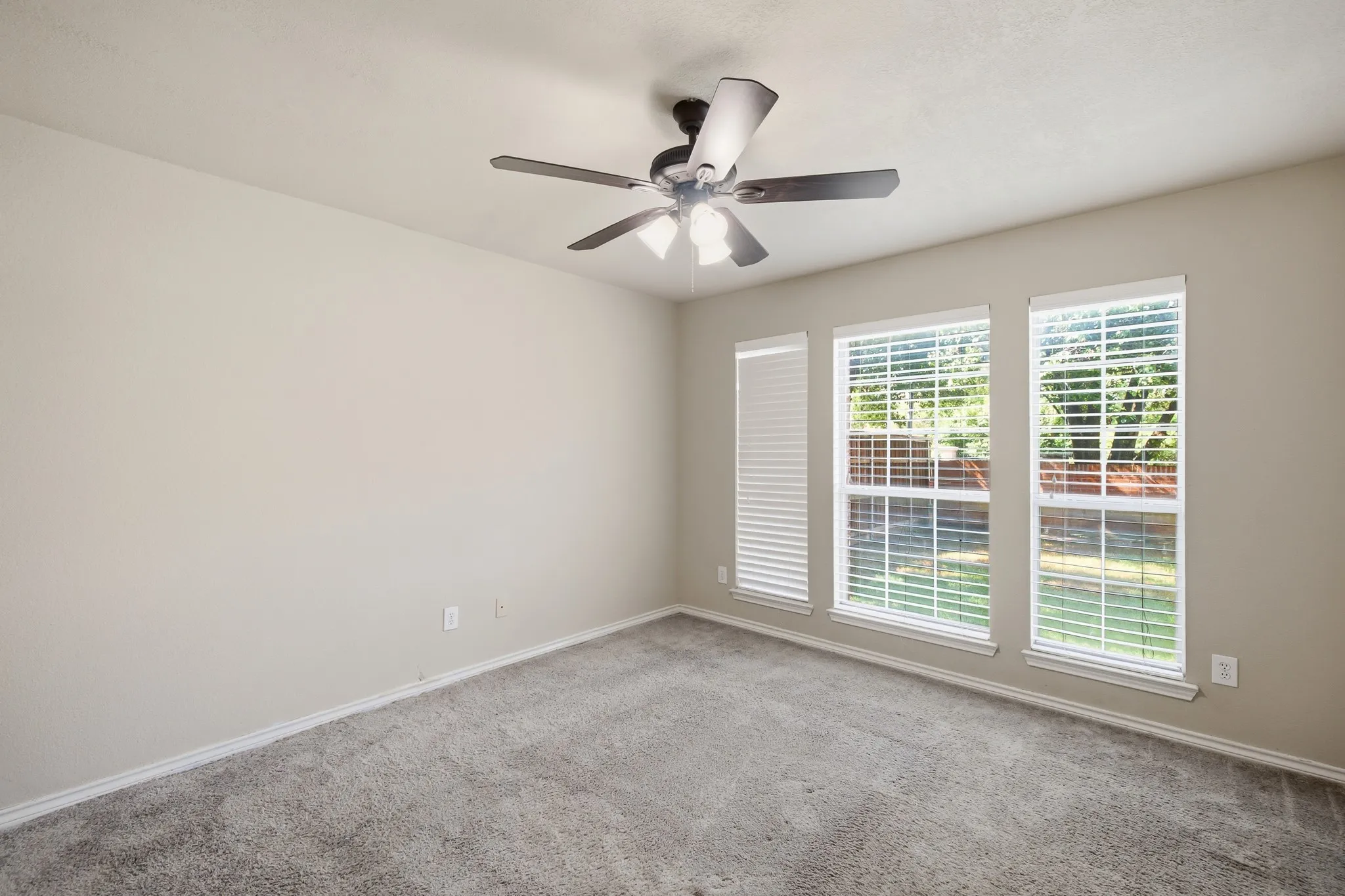 King size first floor bedroom with access to 2 closets.