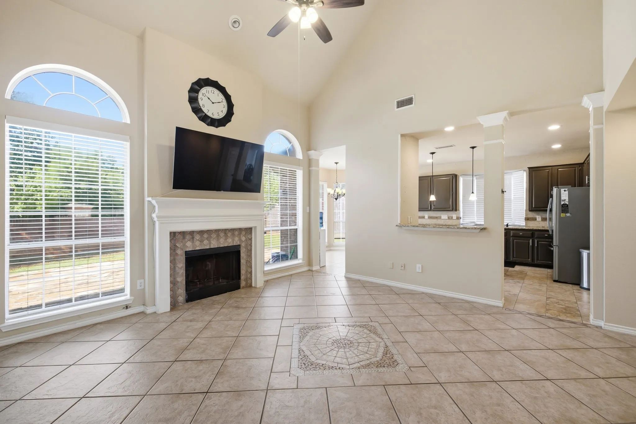 2-story great room in the center of the back of the house is the true hub of the home.