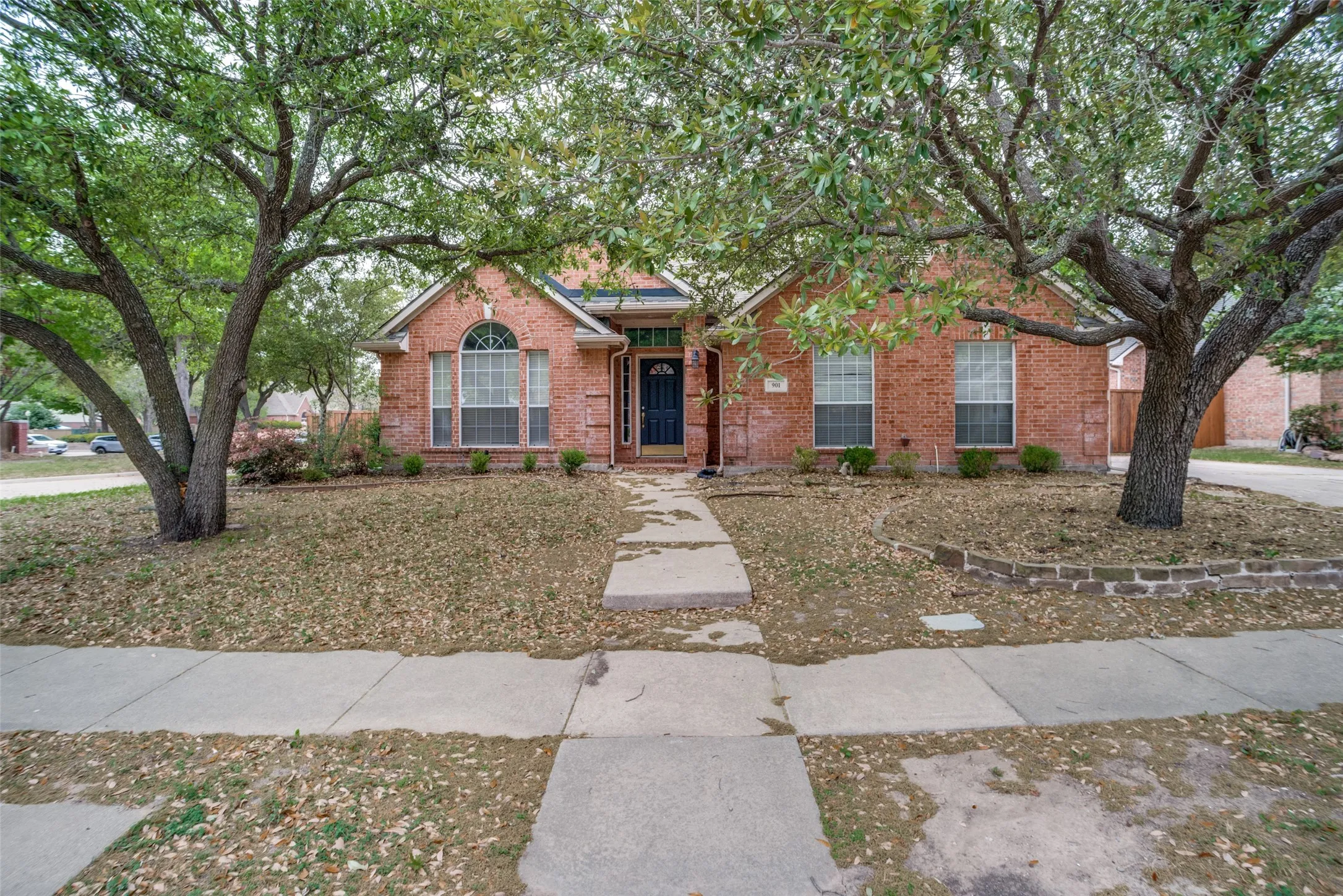 View of front of property with brick siding