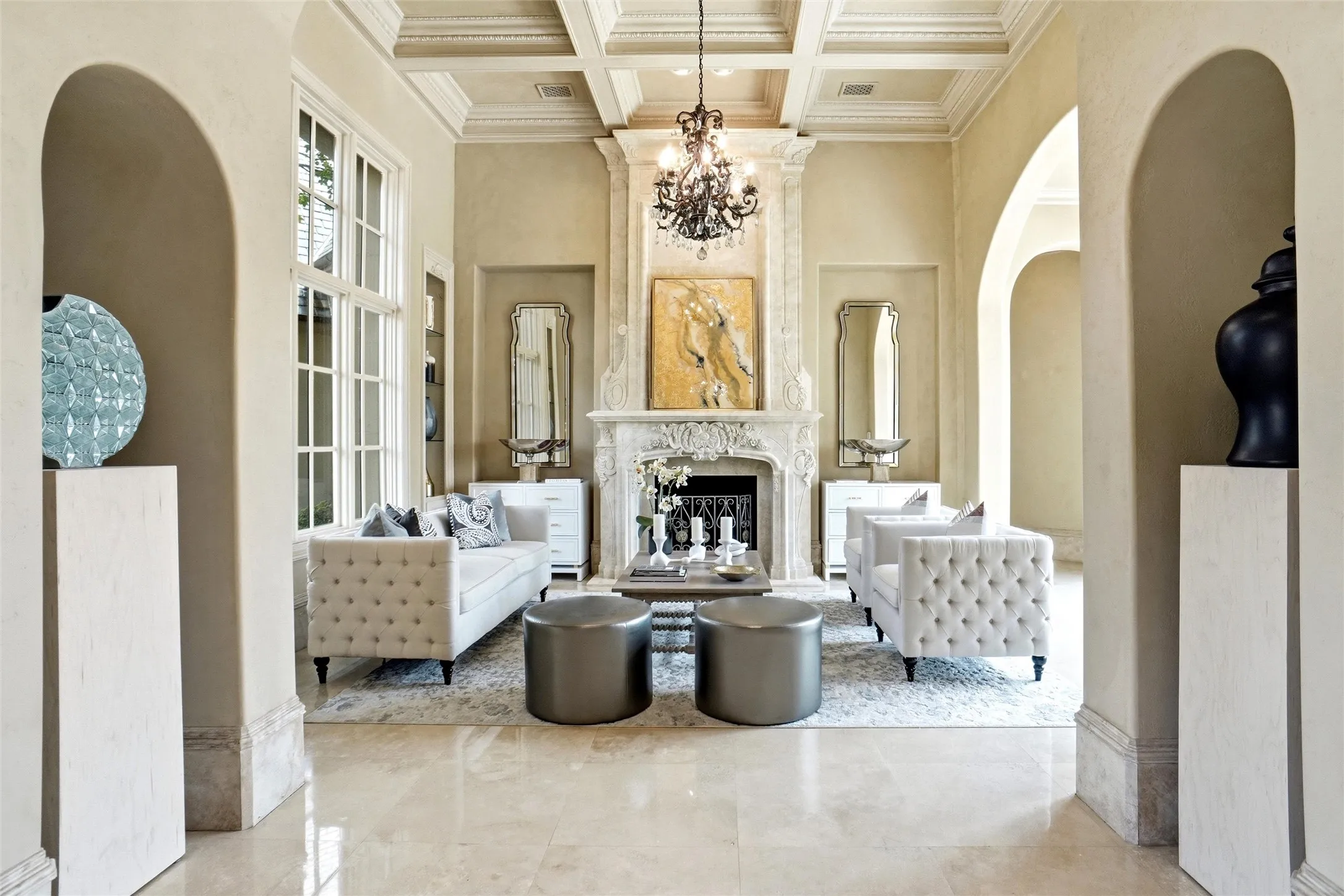 Formal Living Space overlooks the backyard and has built in decorative glass shelves and beautiful gas fireplace.