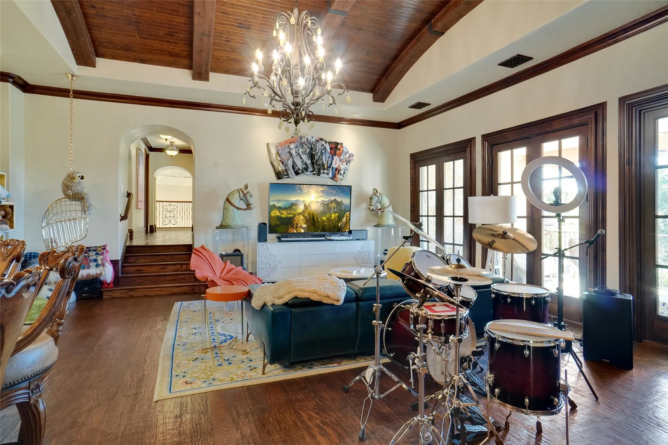 Upstairs gameroom featuring a wood ceiling insert, a walk-out balcony with views of Lake Grapevine, a wet bar, and a convenient kitchenette.
