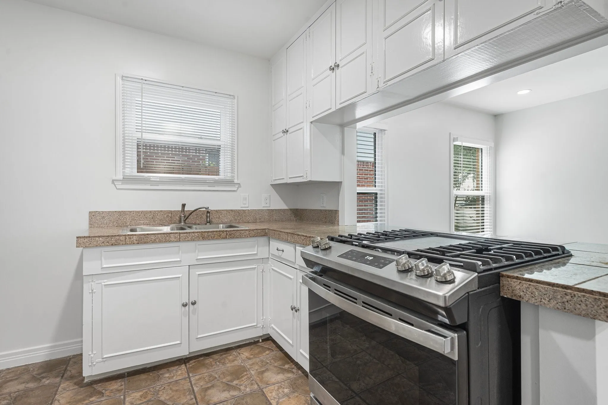 Gas Stove And Almost New Refrigerator With Ice Maker.