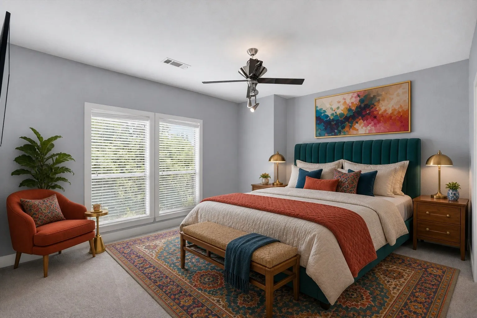 Primary Bedroom with Teal Upholstered Headboard, Ceiling Fan with Integrated Lighting, Large Glass Doors with Plantation Shutters, Hardwood Nightstands, and Patterned Area Rug Anchoring the Space