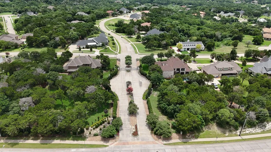 Sprawling residential area featuring tree-lined streets and varied architectural home designs