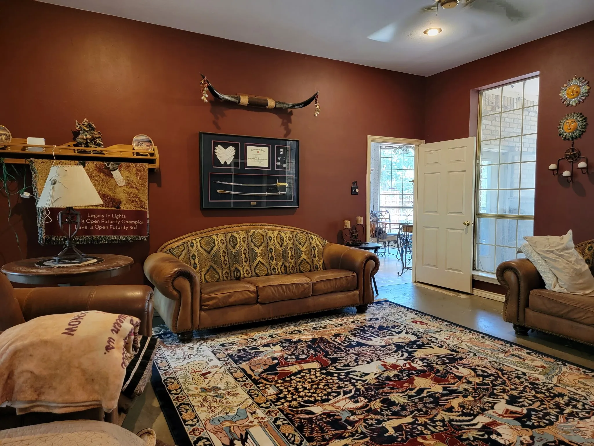 Spacious room featuring rich wall tones and high ceilings