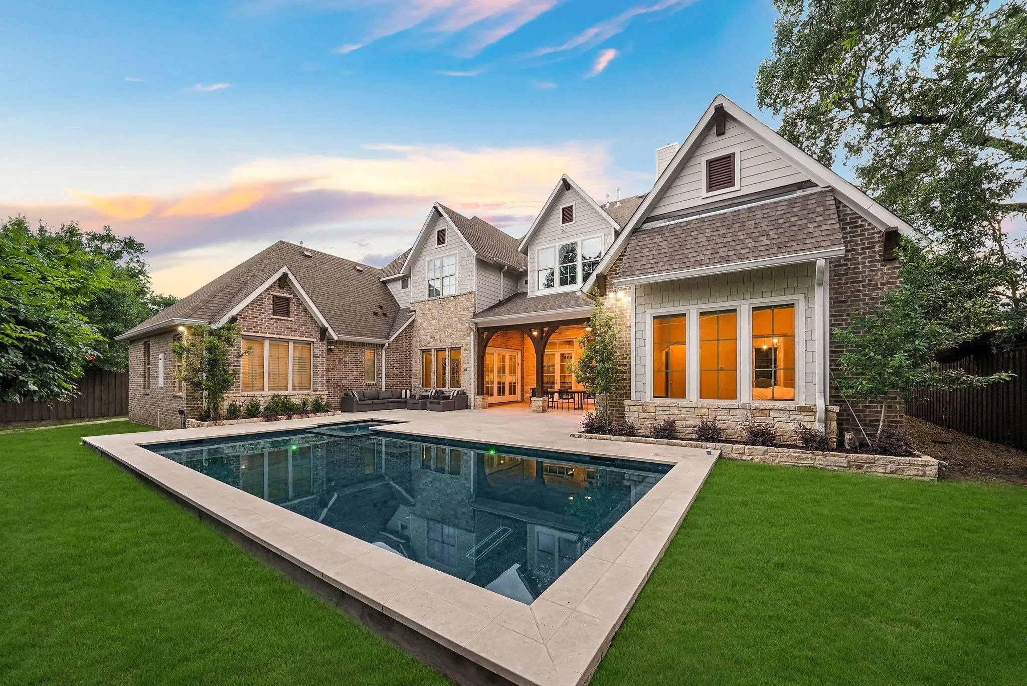 Rectangular swimming pool with light-colored coping