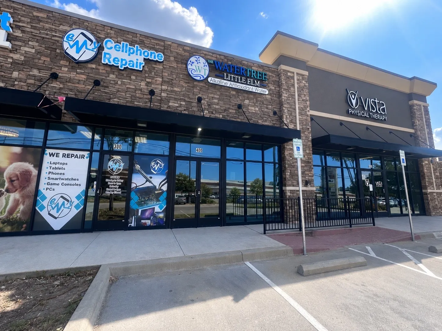 Stone facade with integrated signage and awnings