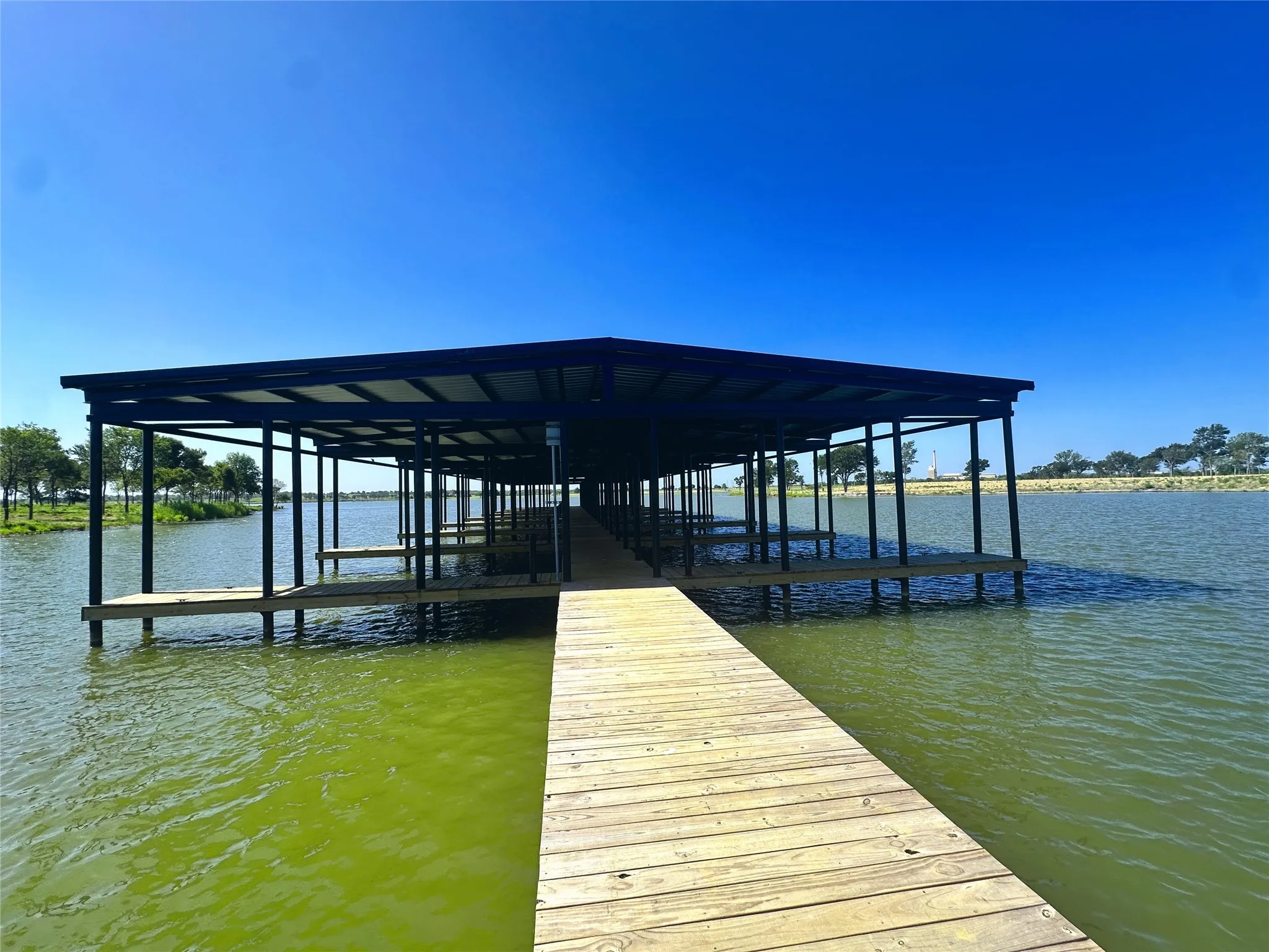 Covered community marina offering protected boat storage and lake access.