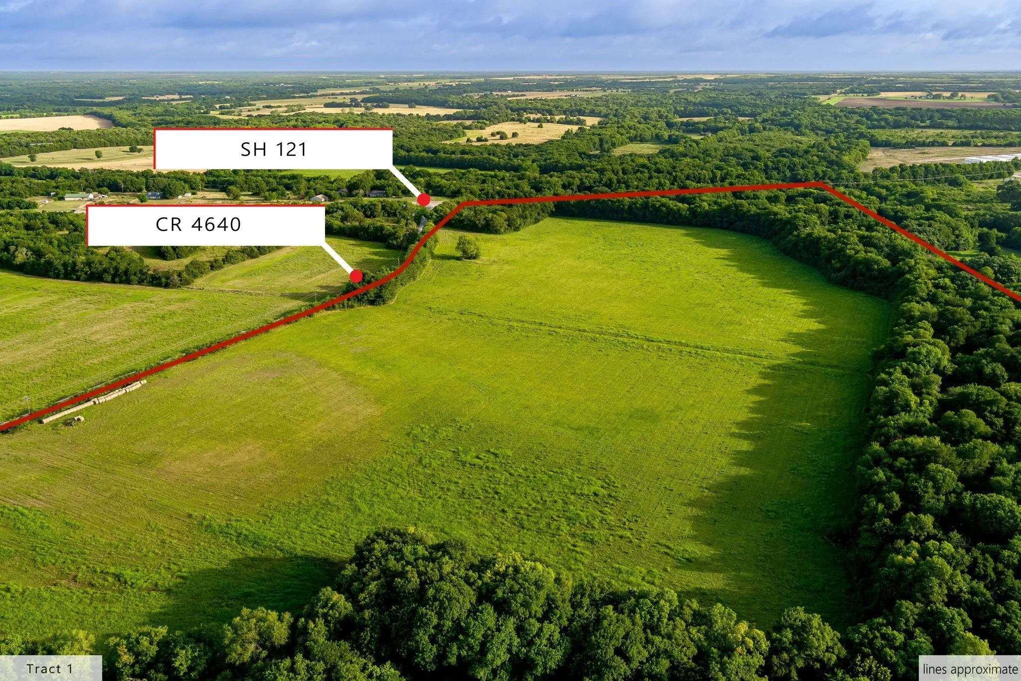 Expansive green acreage featuring dense tree lines, bordering CR 4640 and SH 121