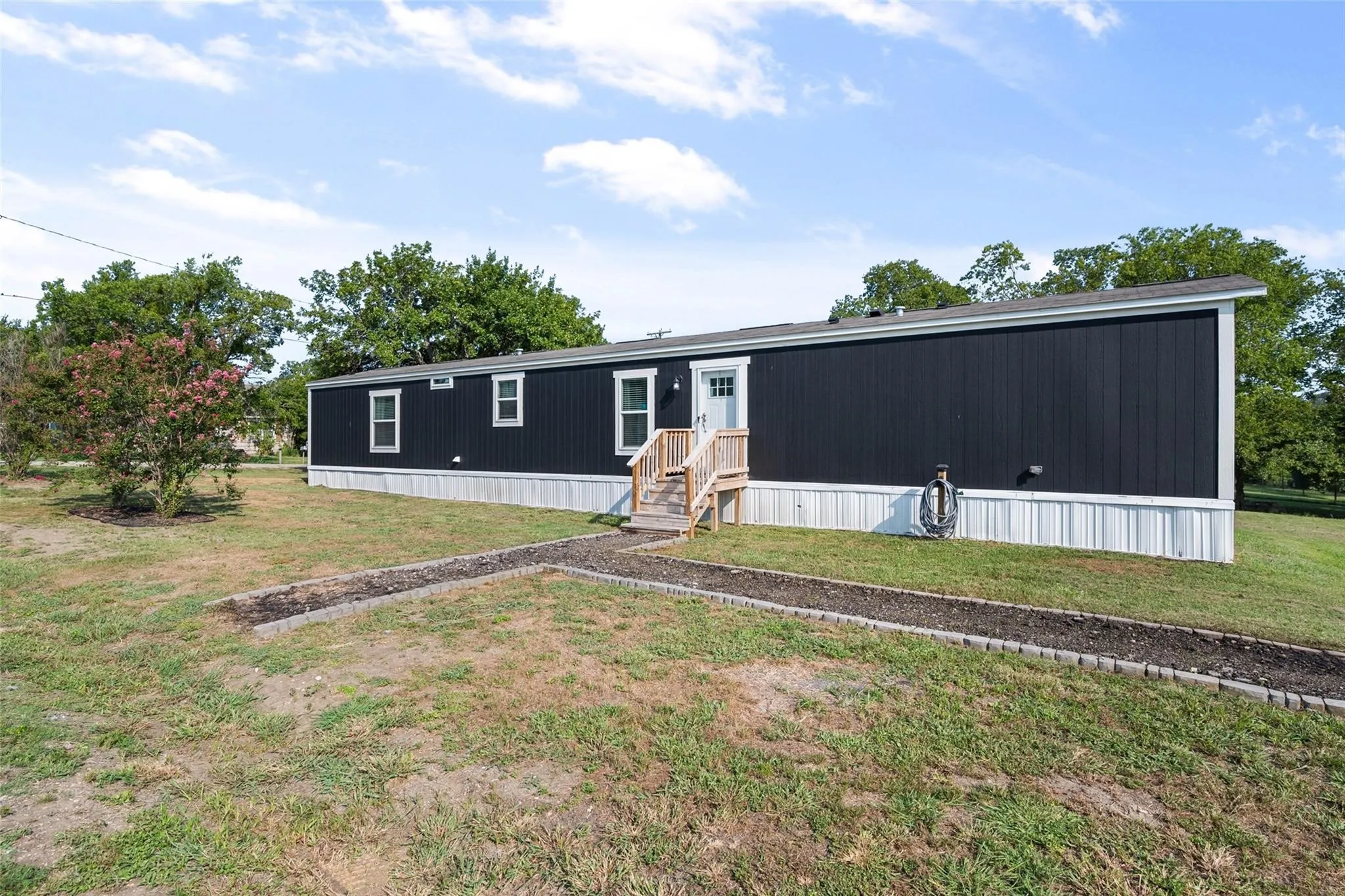 Mobile Home For Sale in Navarro County , 421 S Garitty Street, Frost, Texas 76641, 3 Bedroom, 2 Bathroom, Garage spaces, 1,216 Sqft, built in 2024, mls#21305556, Real Estate Agent in Frost, Homes For Sale in Navarro county, Homes For Sale in Frost, Realtor in Frost Texas, Real Estate Brokerage Independent Realty Texas, Luminita Cordes Realtor