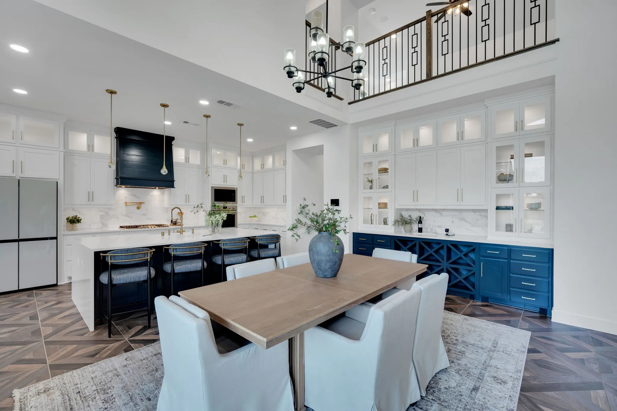 Dining room with custom hutch with lighted cabinets, build in wine rack.