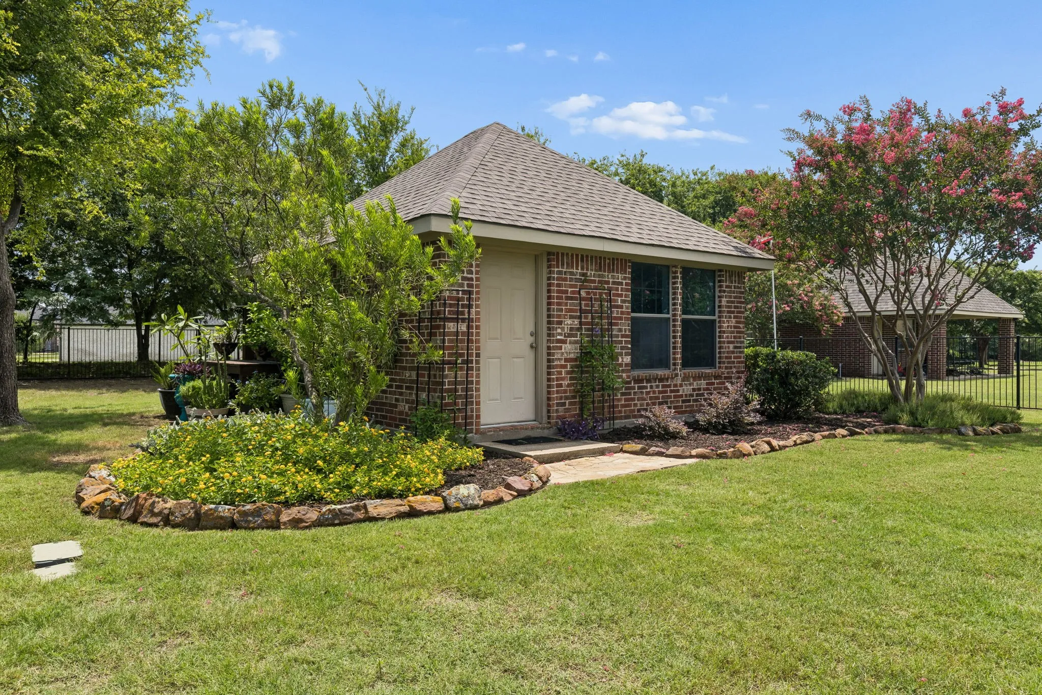 This property also has a detached garage (garage door not shown) perfect for a workshop or lawn equipment!