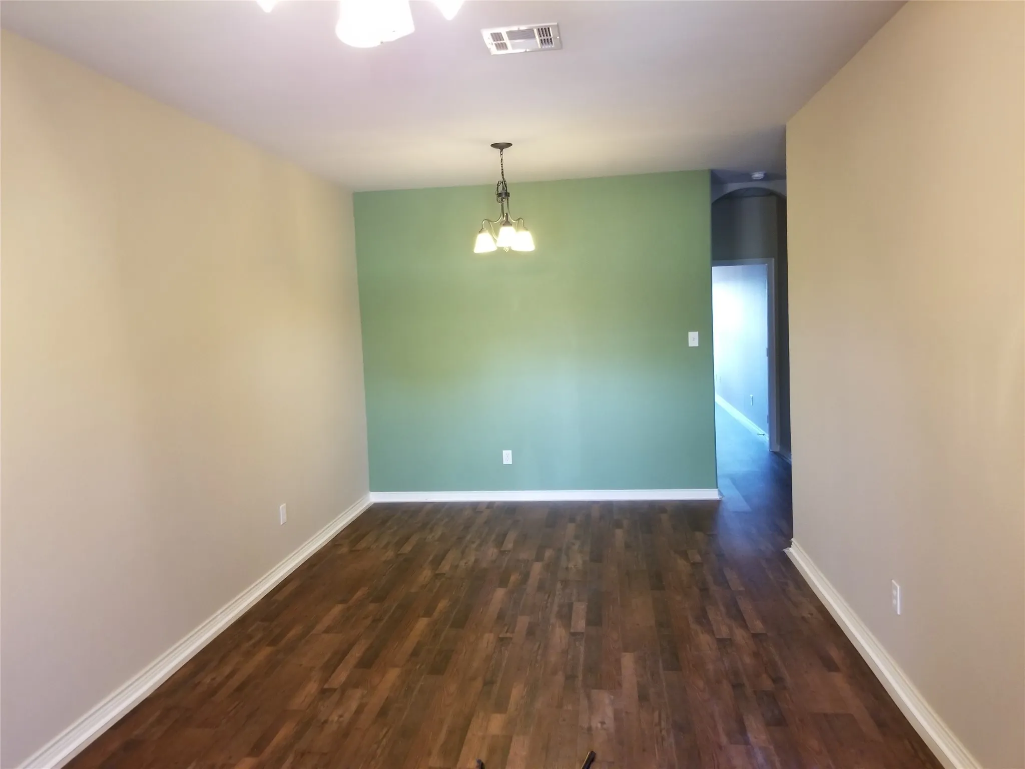 Notice upgraded LVP flooring throughout the home.