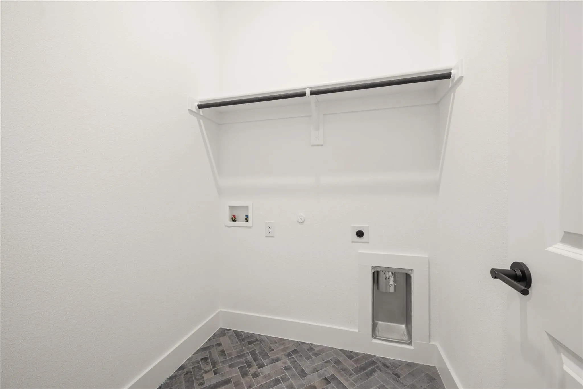 Laundry room featuring hookup for a gas dryer, hookup for a washing machine, and hookup for an electric dryer