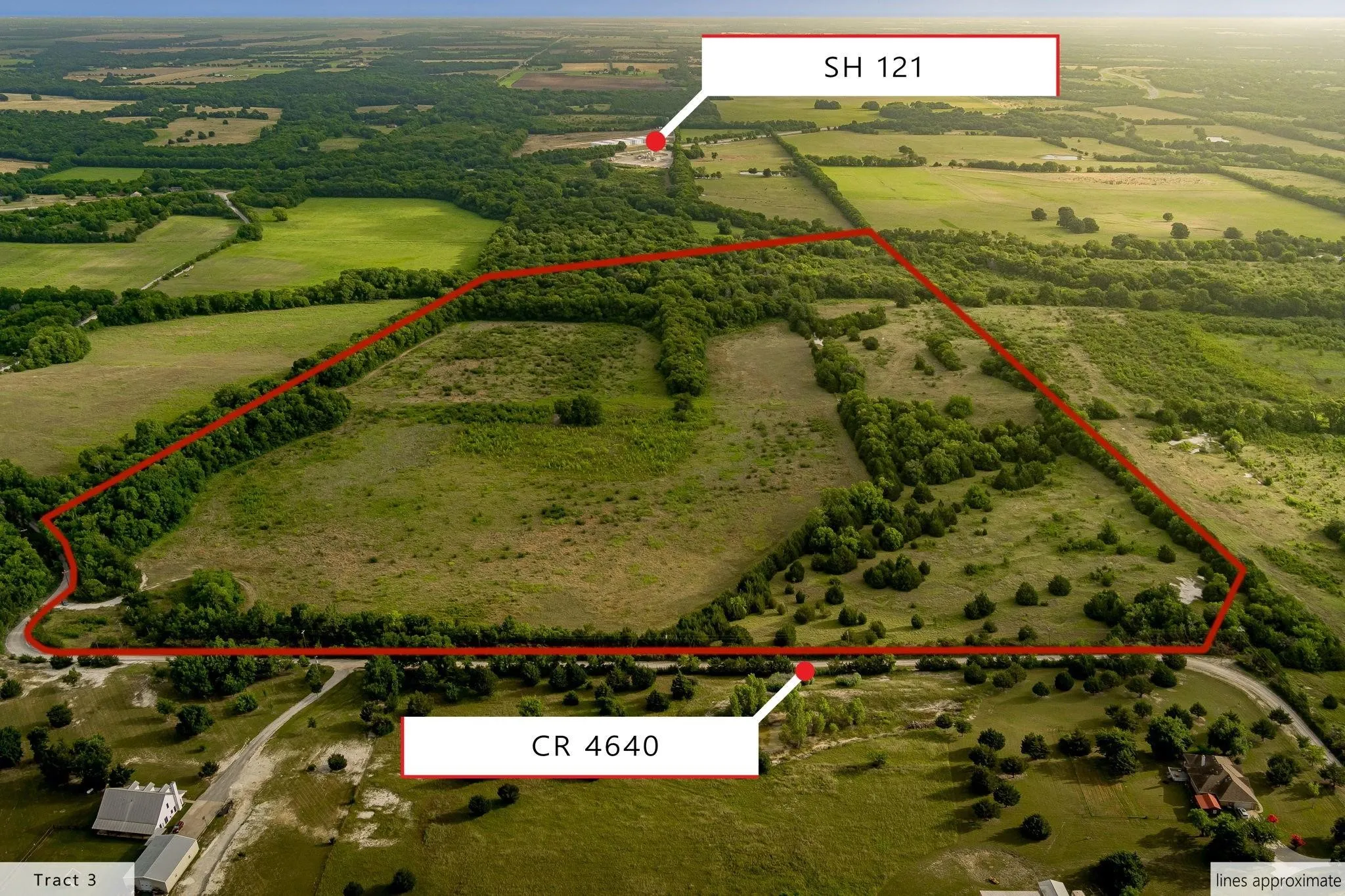 Expansive rural land parcel featuring varied terrain including open fields and wooded​​‌​​​​‌​​‌‌​‌‌​​​‌‌​‌​‌​‌​​​‌​​ areas
