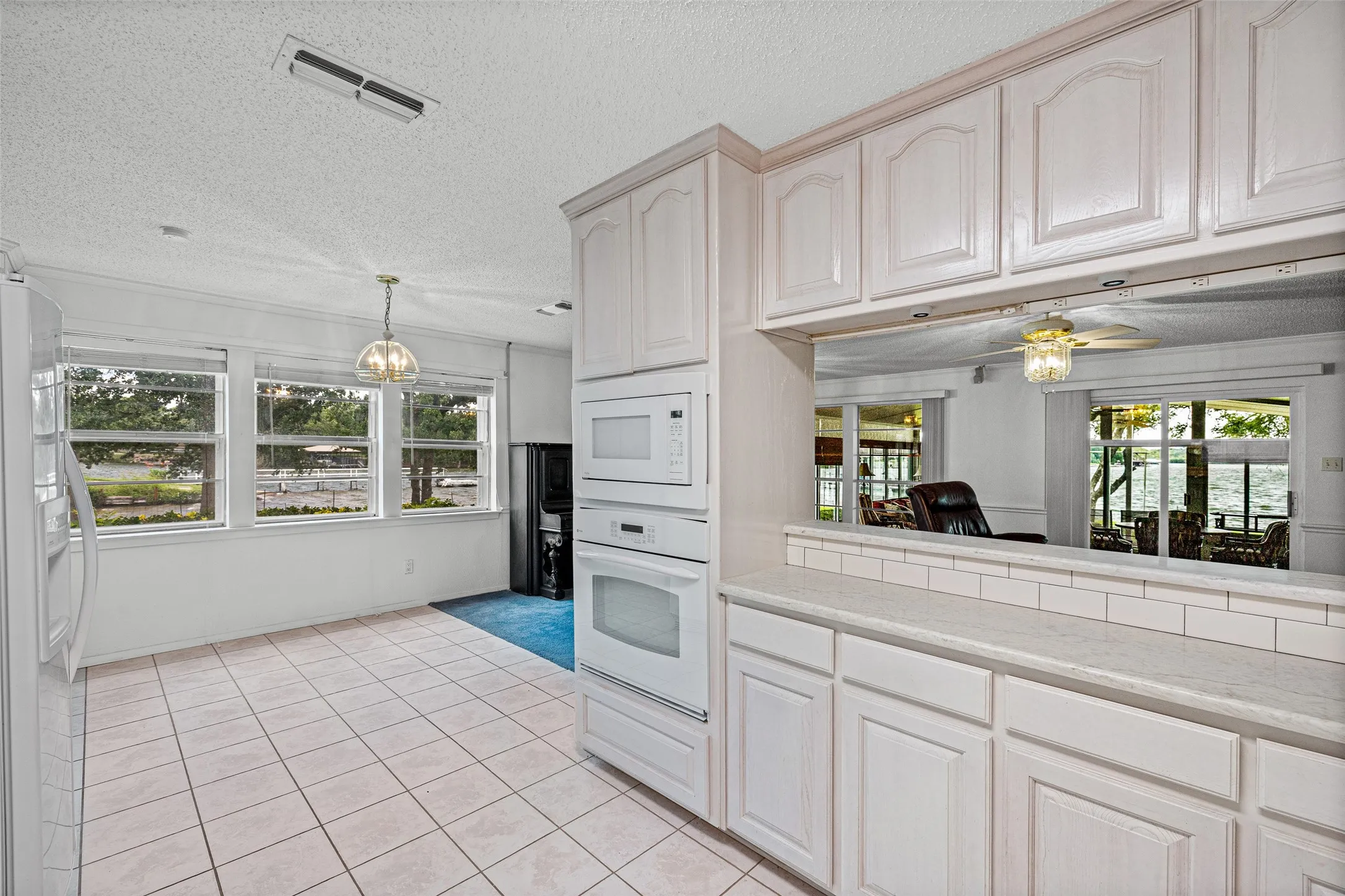 And you can see the outside from anywhere in the kitchen. There IS an exit door to the left of this picture to the outside.