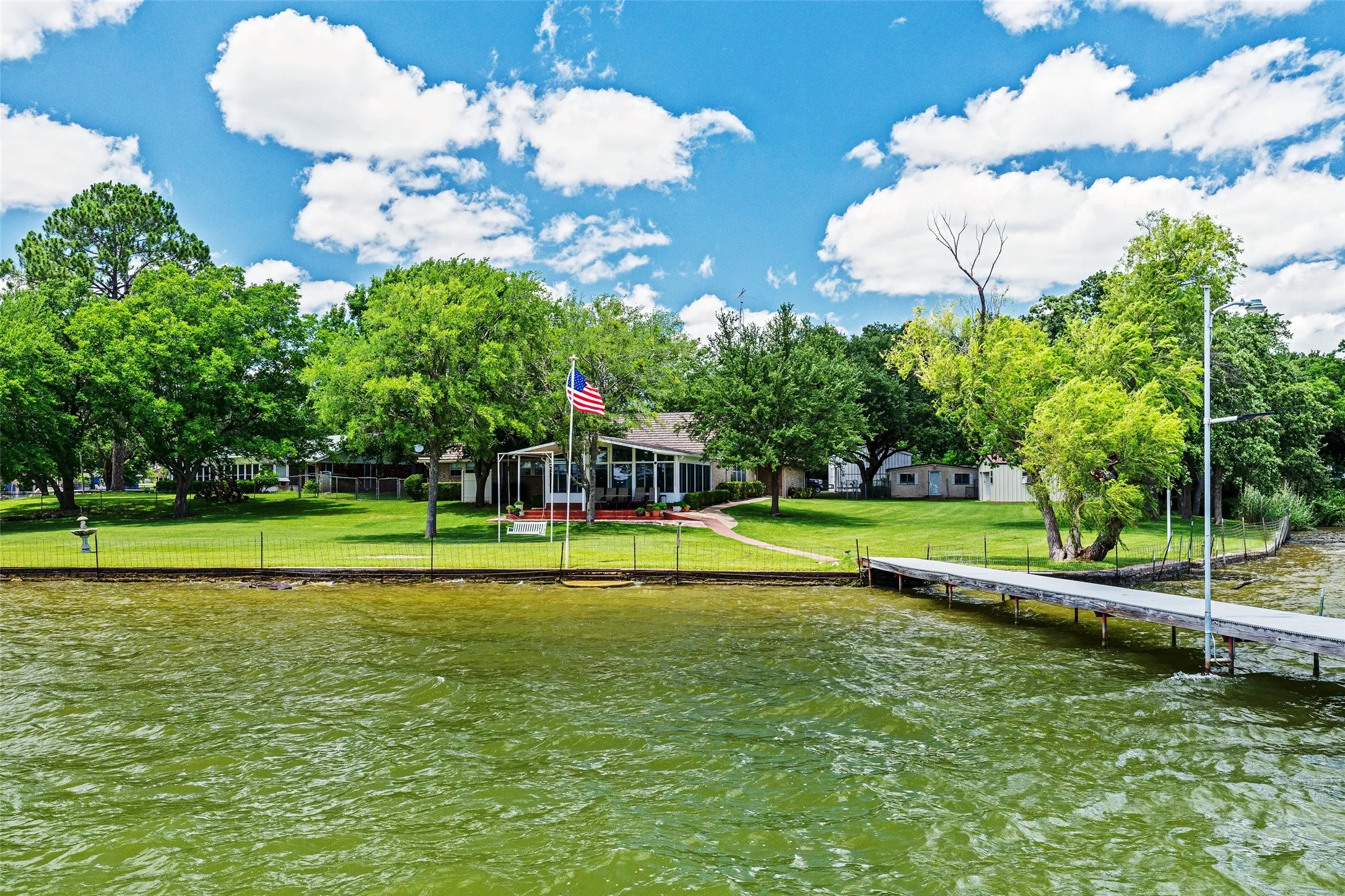 This is the daytime view of your home and yard from the dock end...