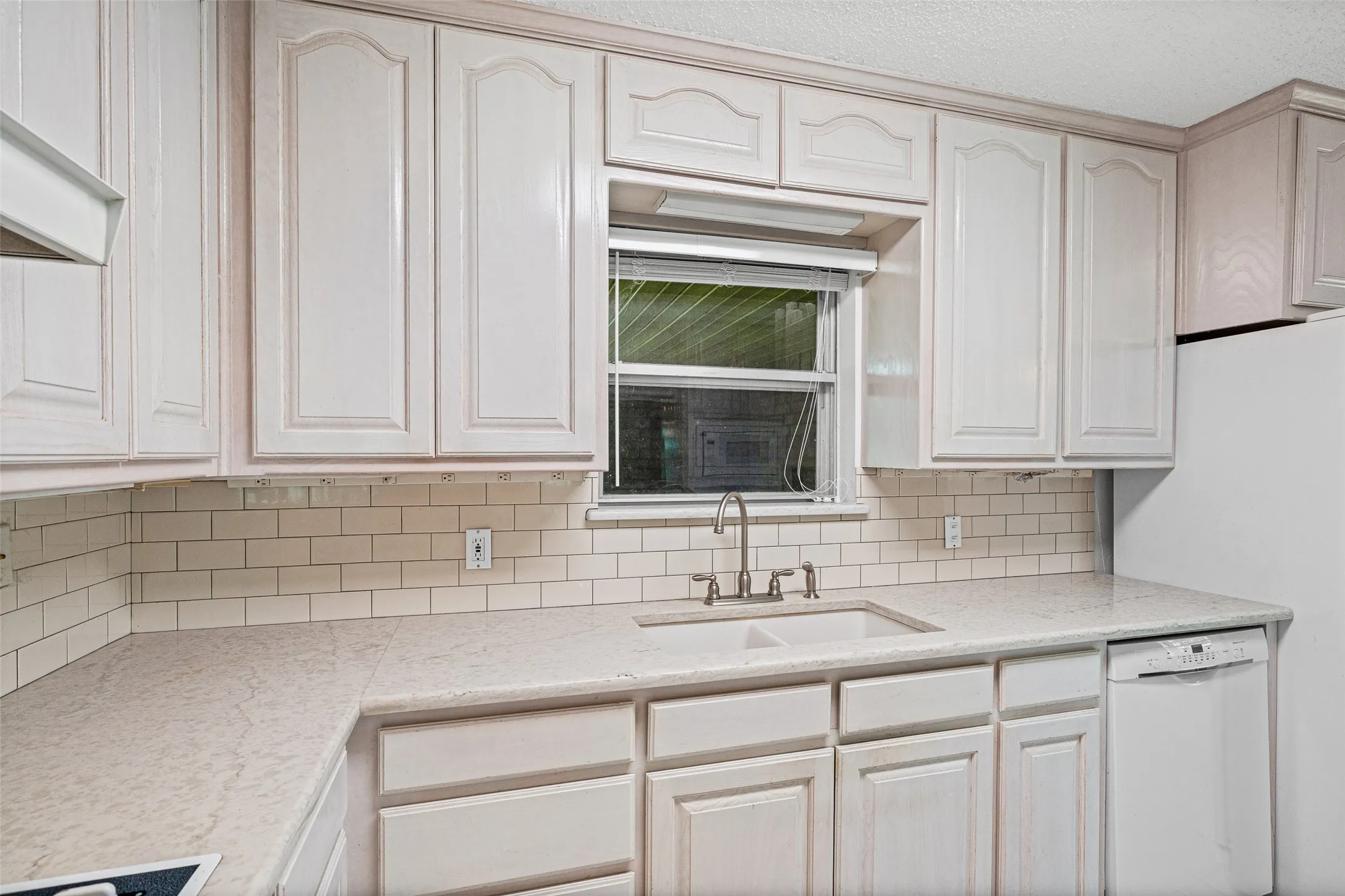 Look through to the laundry room from the kitchen.