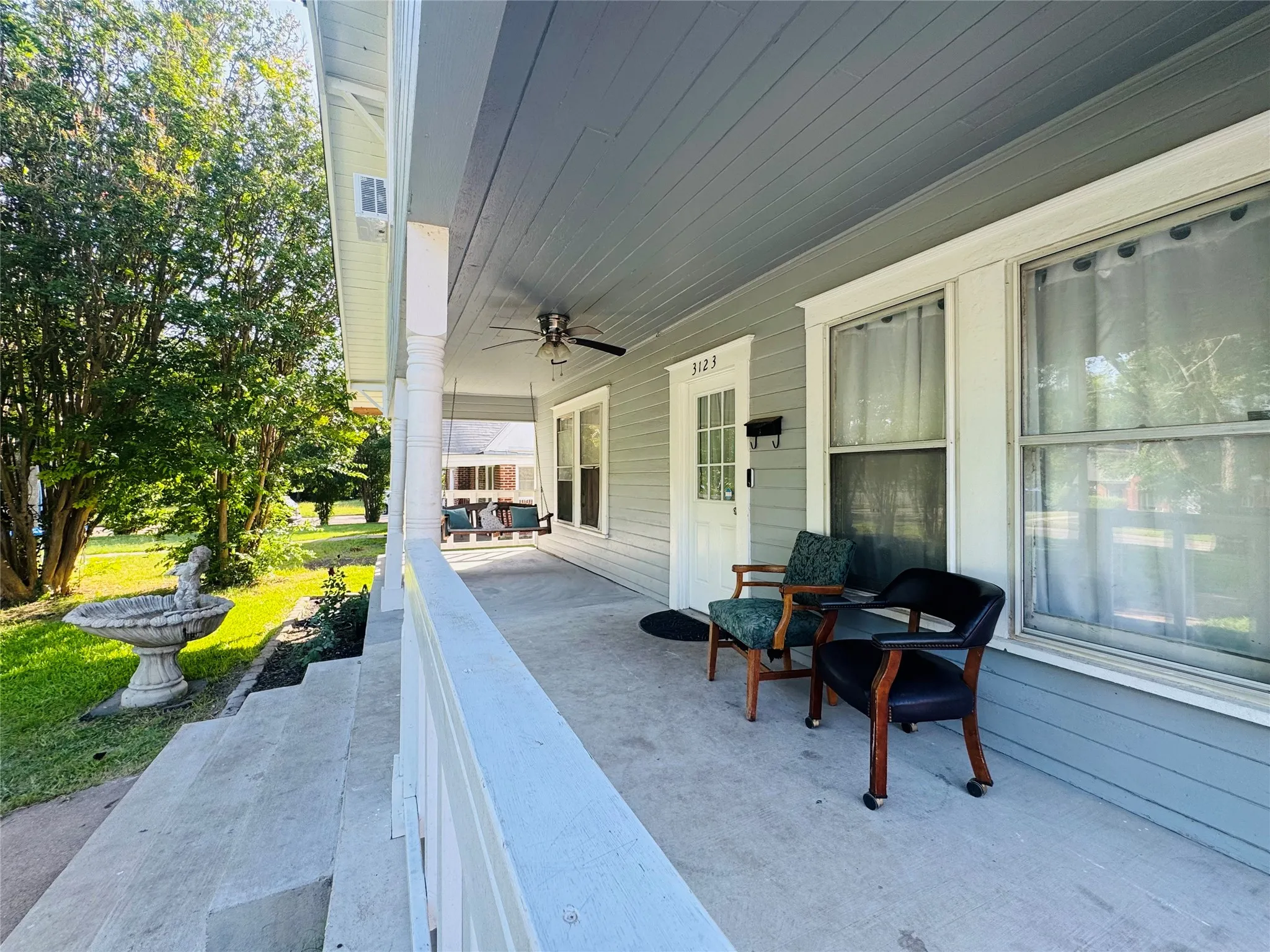 Front porch with a paneled ceiling, recessed lighting, and a ceiling fan