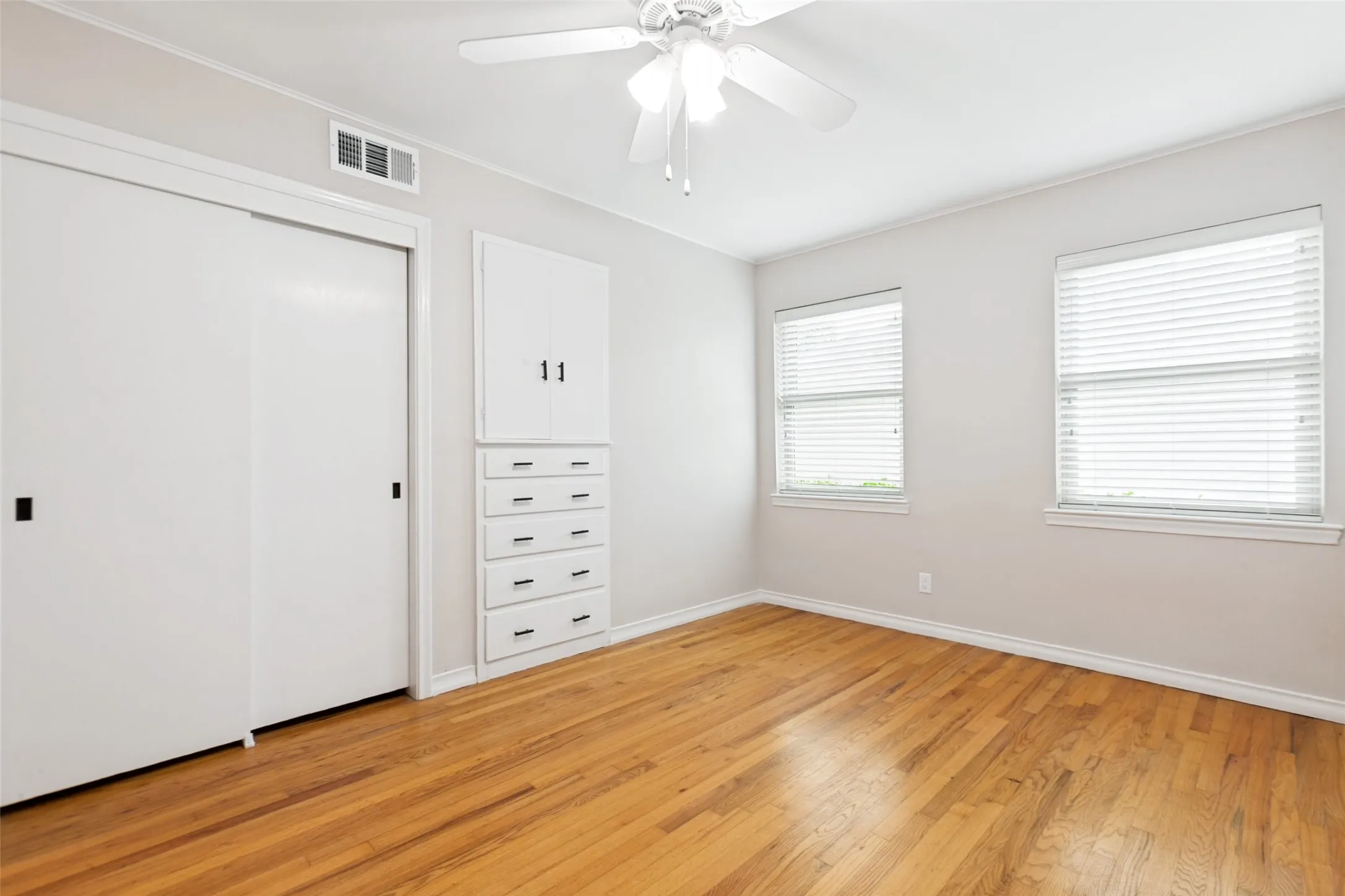 Enjoy beautiful hardwood floors, a double closet and handy built-ins!
