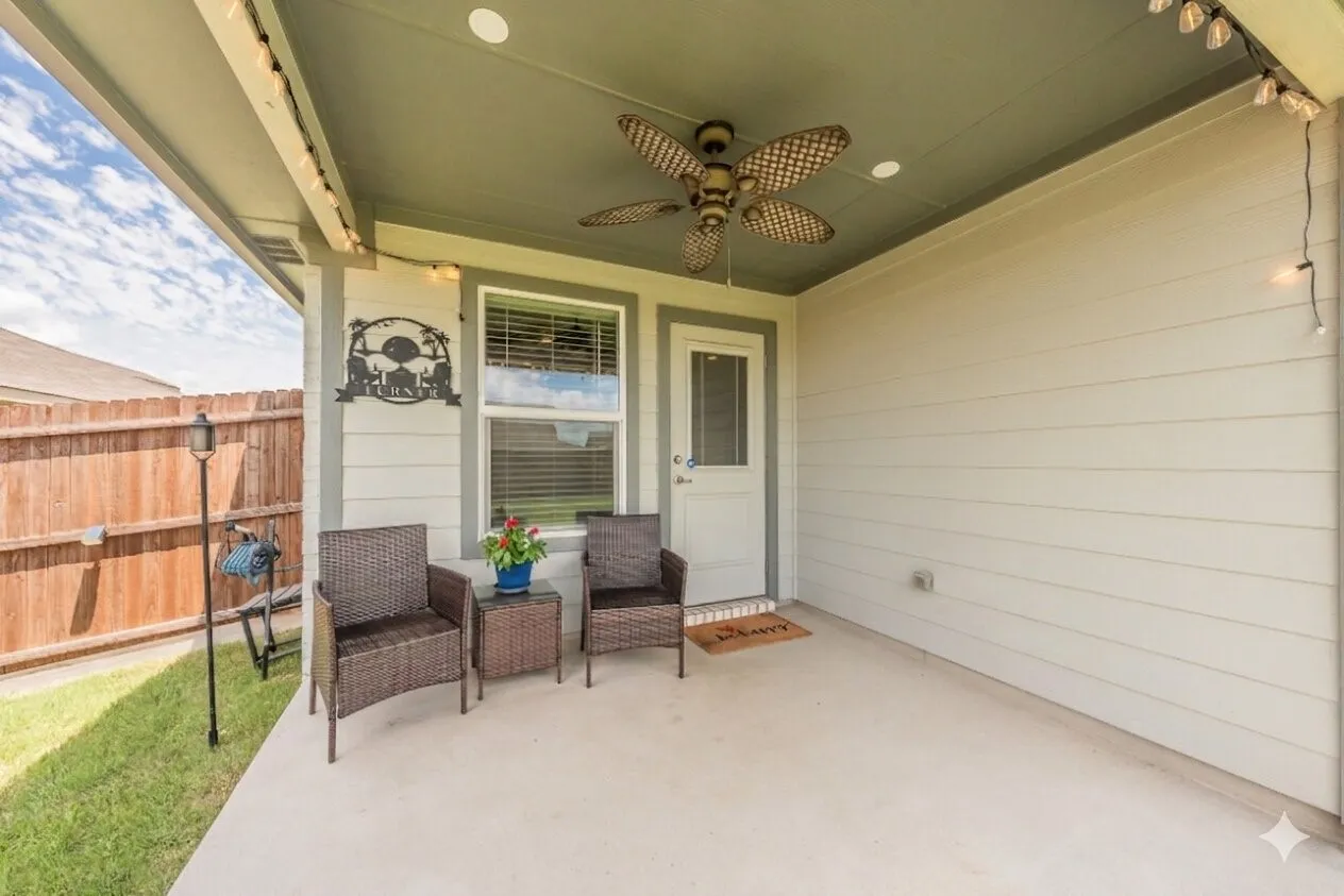 Covered patio featuring a ceiling fan, recessed lighting, and a solid privacy fence
