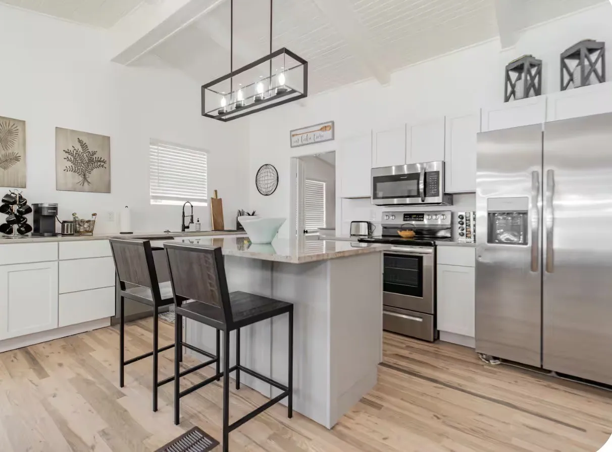 Gorgeous kitchen with eat at bar.