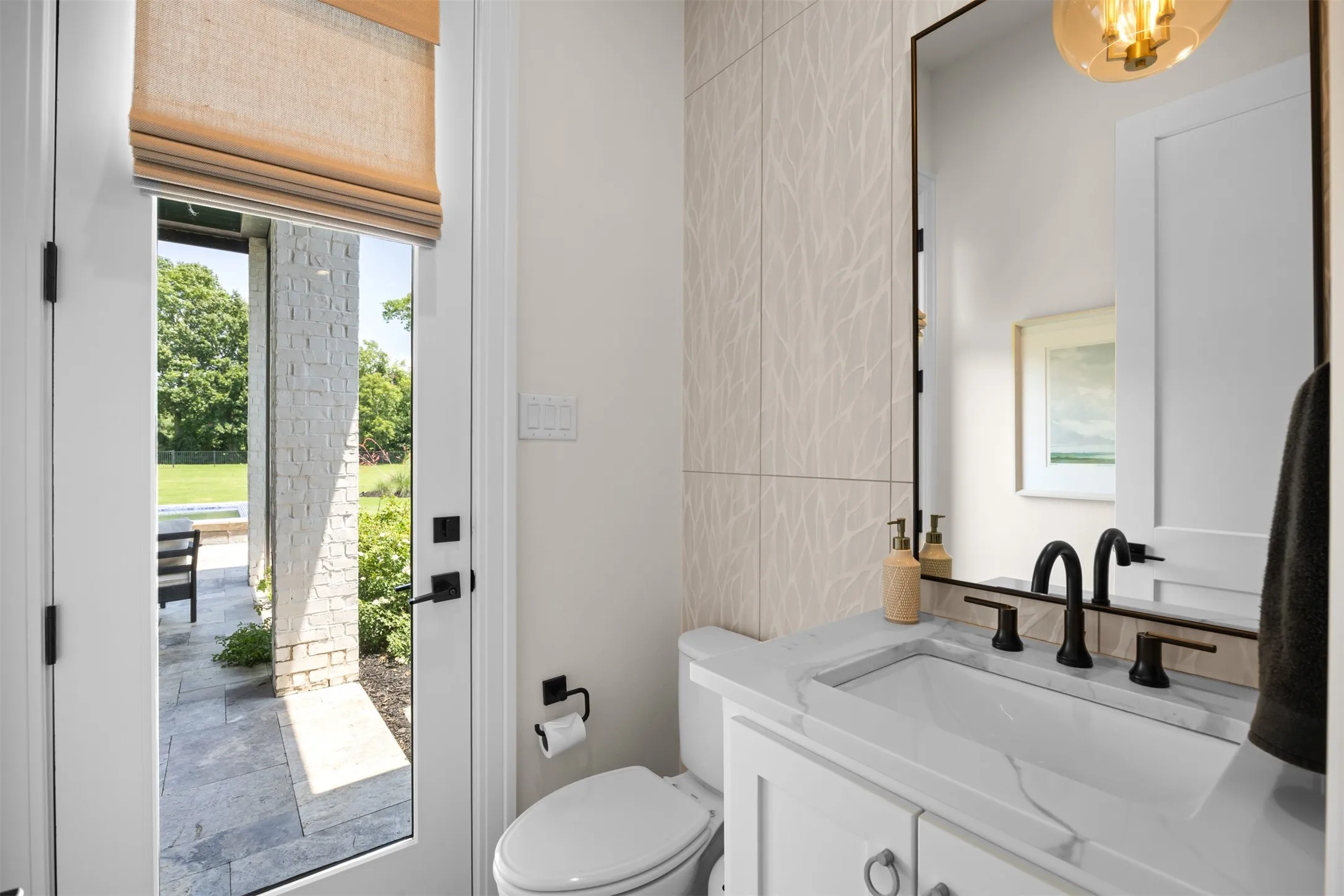 This makes a wonderful pool bath with a gorgeous finish out & access to the covered patio