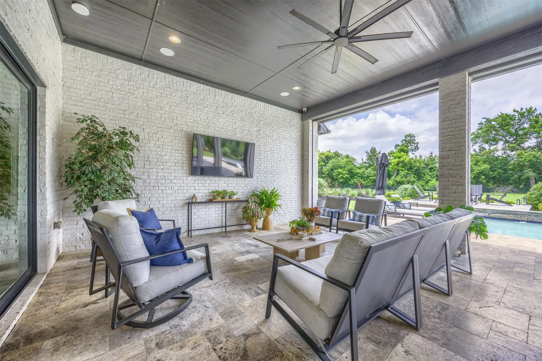 A thoughtfully planned layout & elevated design selections create an environment that is as functional as it is breathtaking. Step through the impressive sliding doors to discover your own backyard paradise.