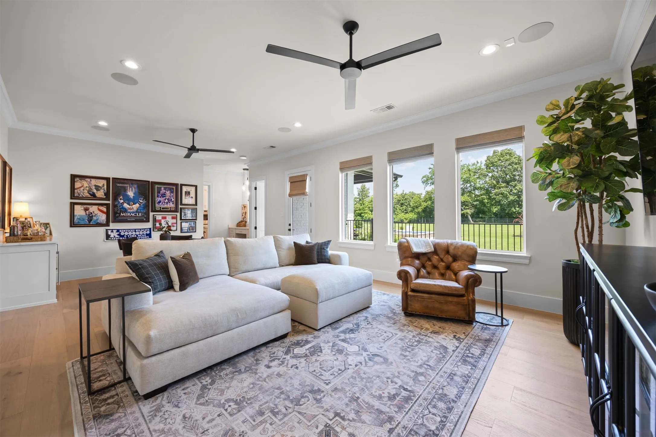 This space is huge & can be used for many purposes. Designed with entertaining in mind, the expansive game room invites movie nights, celebrations, and game day gatherings to make memories. There's also built in wine bar with a beverage fridge! Nice!