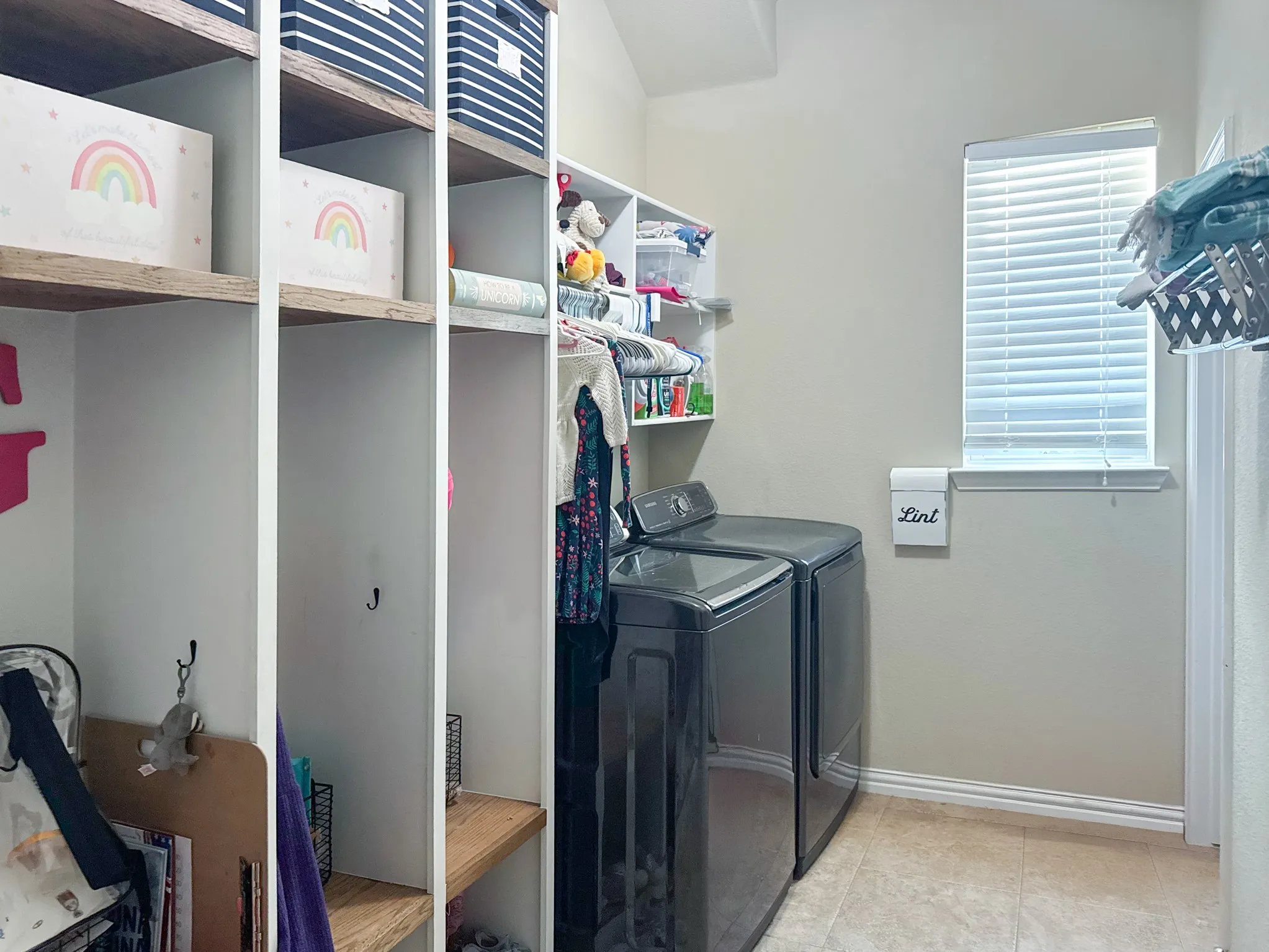 Primary Closet connects the Laundry Room to the Primary Suite.