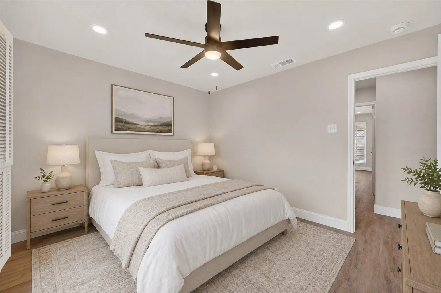 Bedroom featuring recessed lighting, a ceiling fan, light wood-finish flooring, and a white trim package