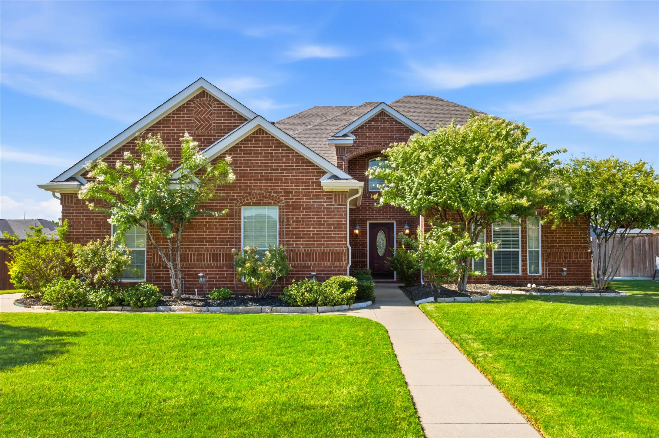 Beautifully landscaped, coveted neighborhood