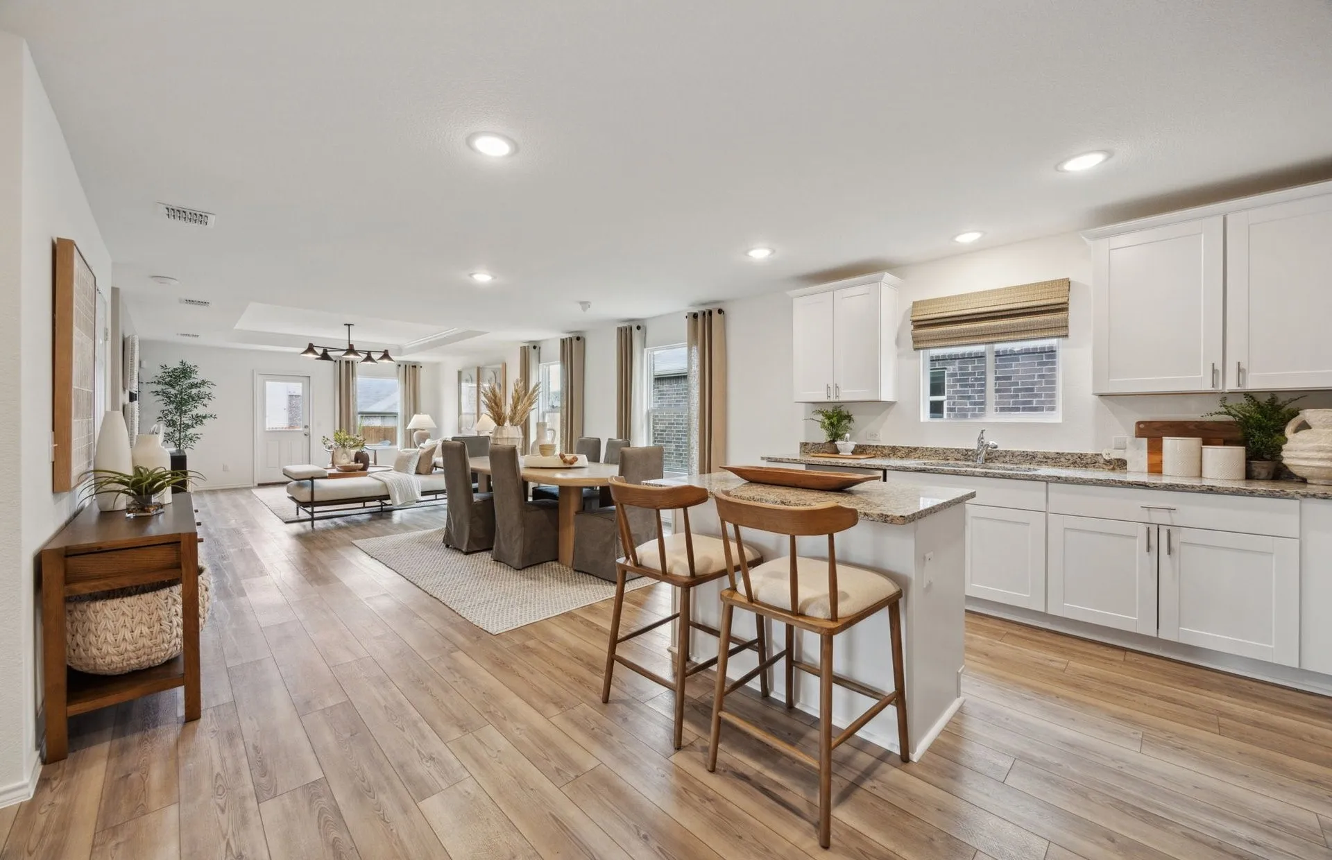 *Model Representation - Spacious kitchen with eat-in bartop island