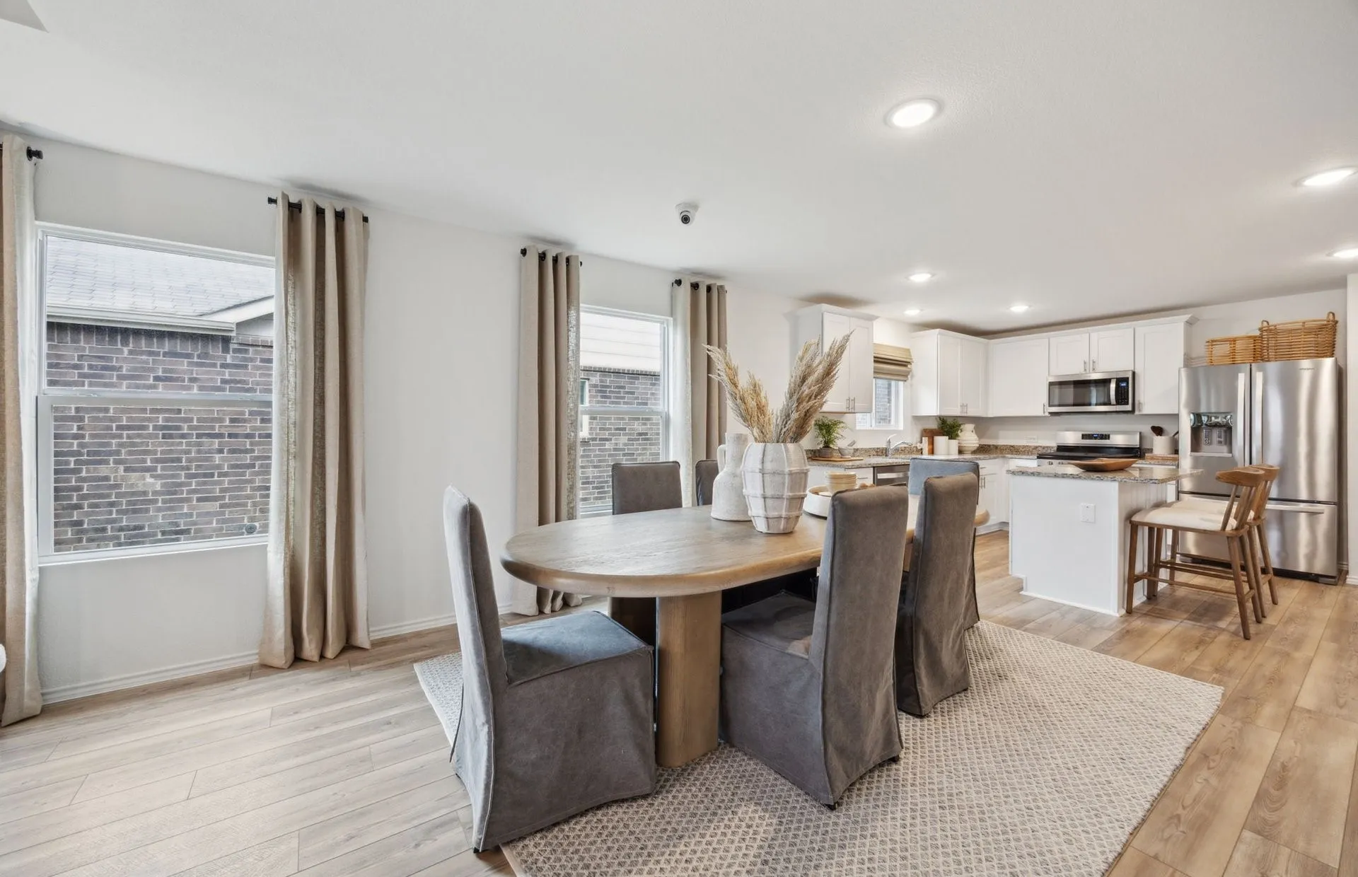 *Model Representation - Dining area off kitchen with large windows